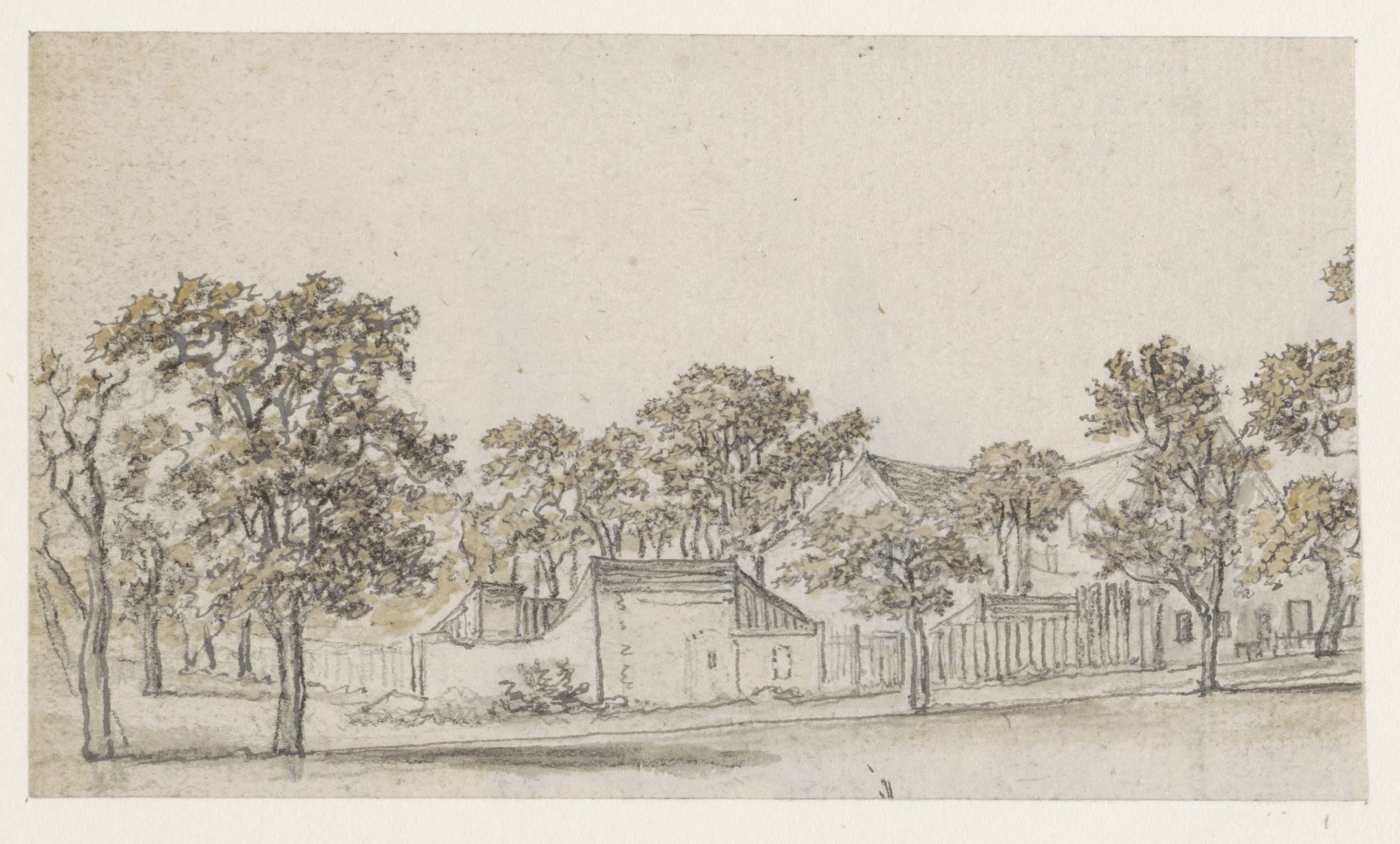 Groep huizen tussen bomen