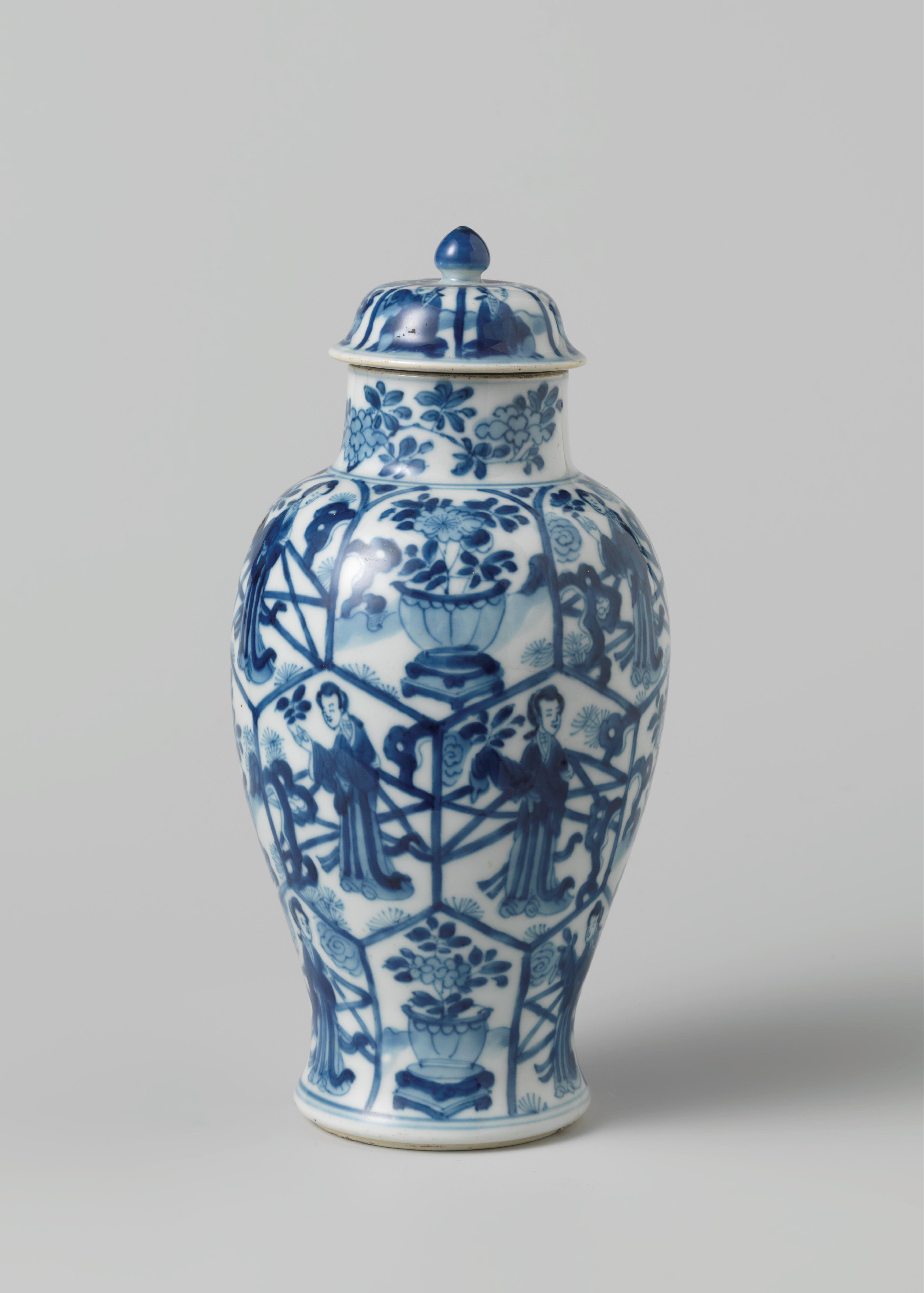 Covered jar with women and flower pots in panels