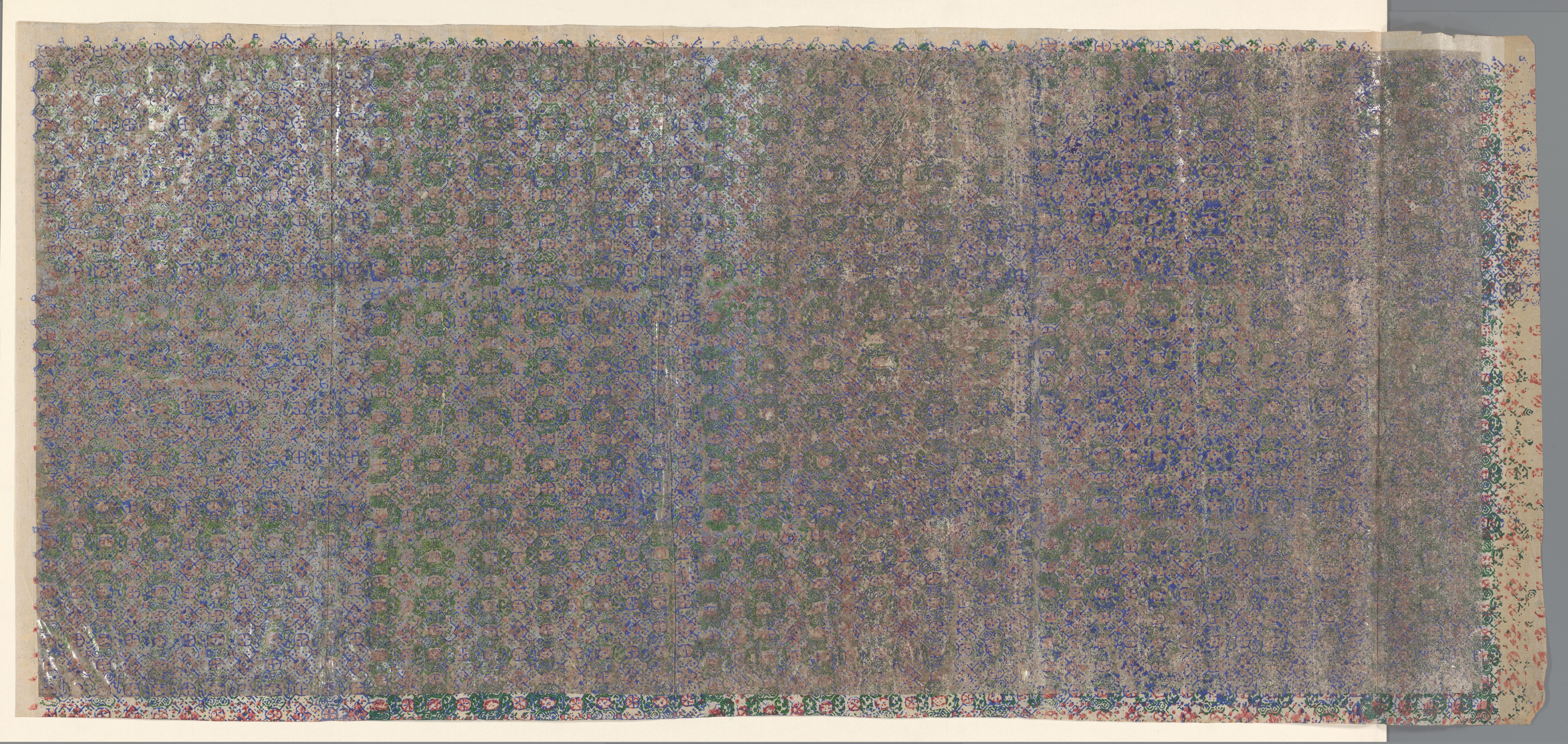Blad met patroon in rood, groen en blauw op zilver