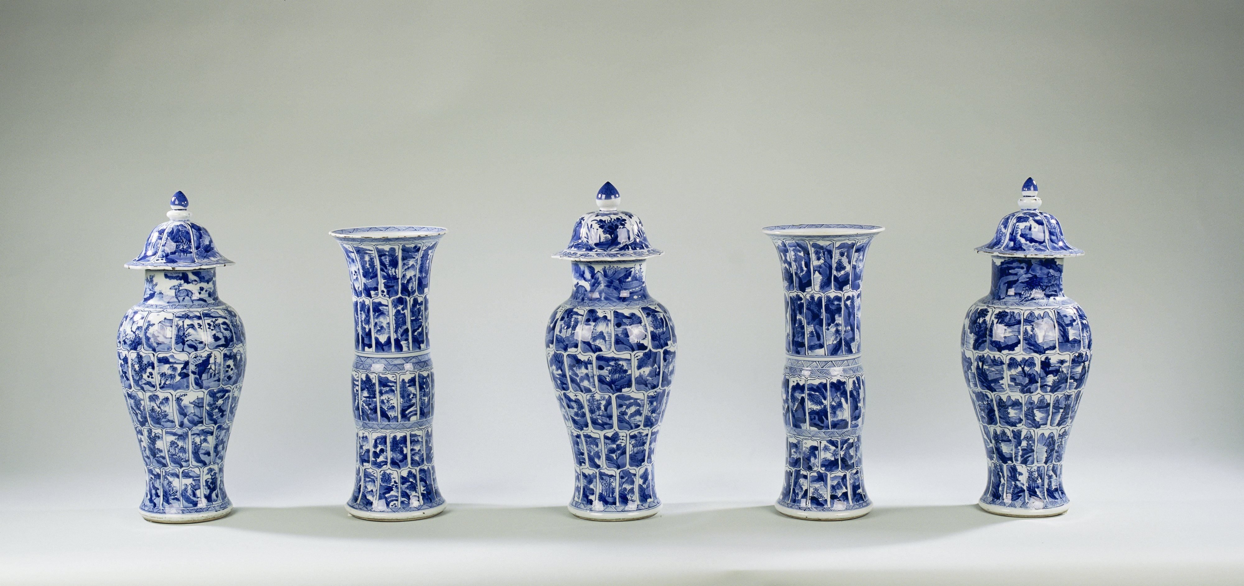 Beaker vase with landscapes in panels