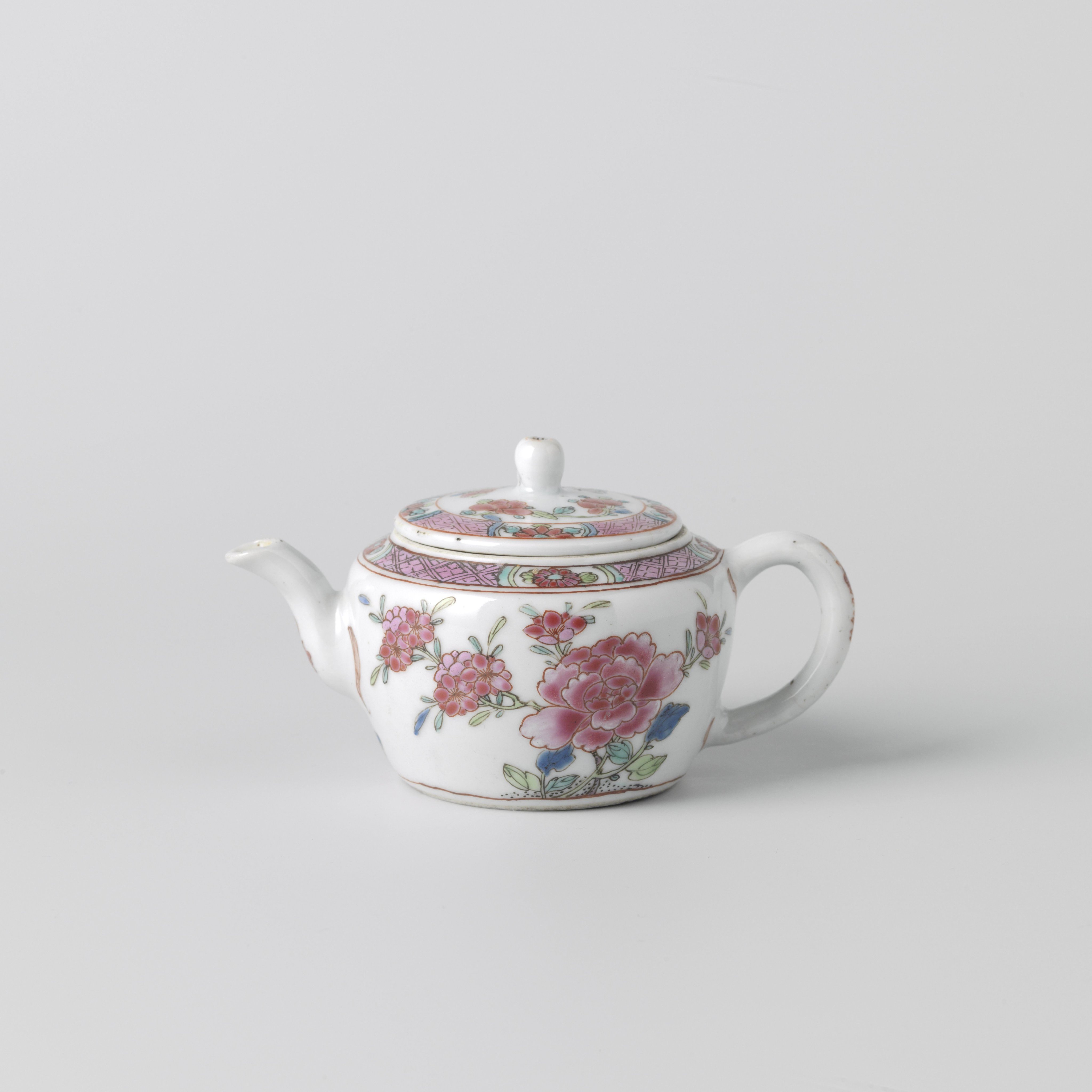 Tea pot with flowering plants and diaper patterns
