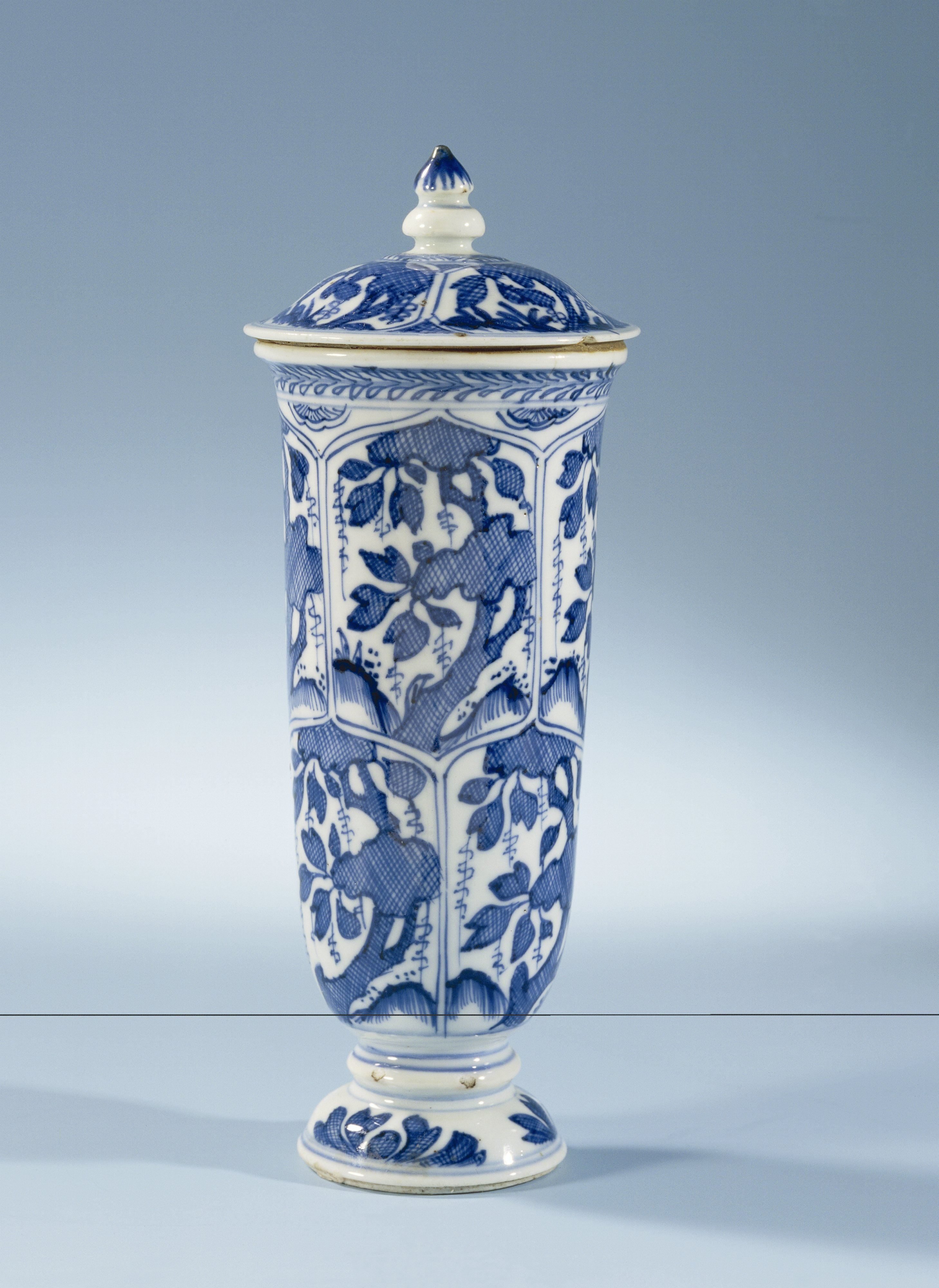 Bell-shaped covered beaker vase with hatched plants in petal-shaped panels