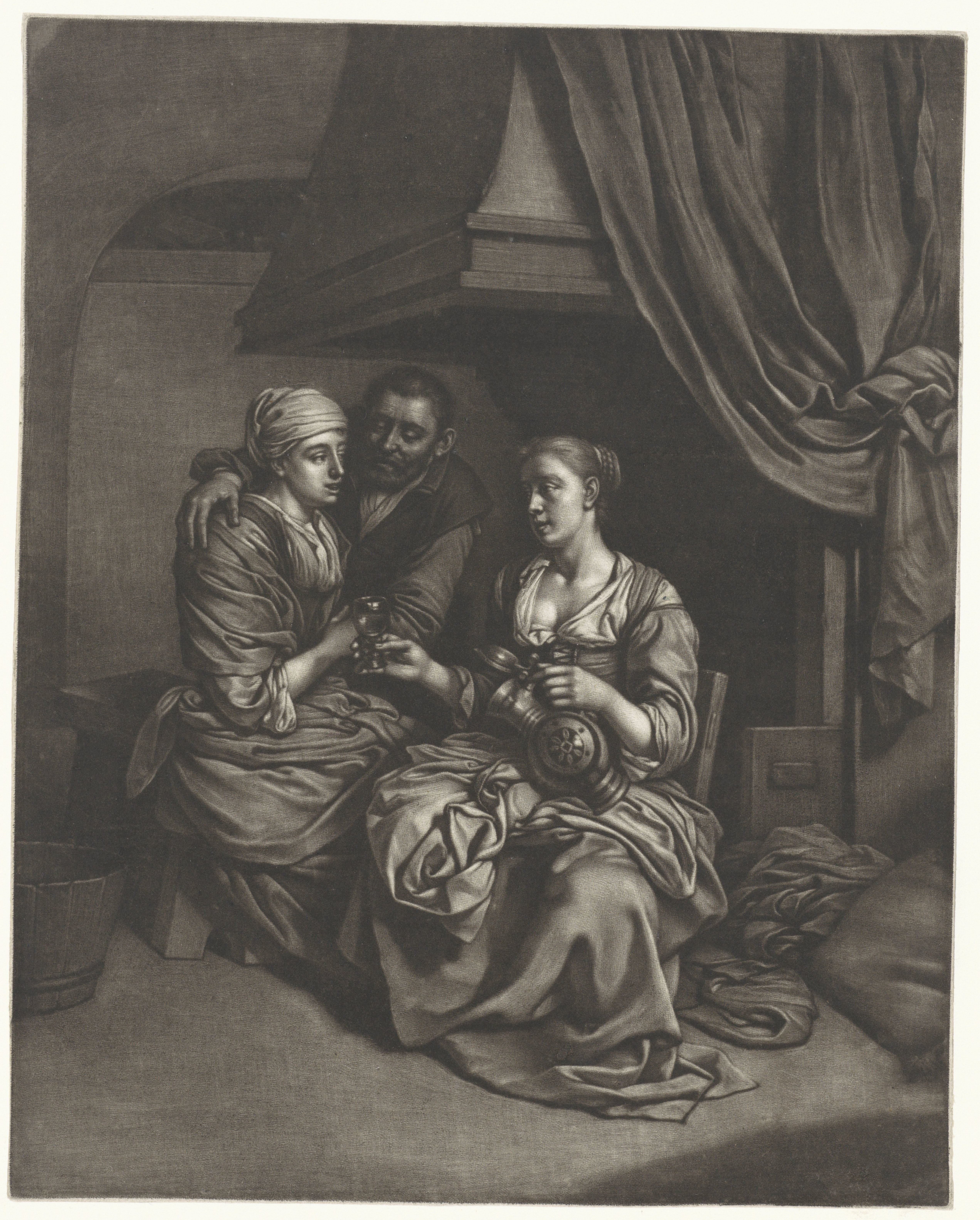 Vrouwen en een man bij de haard