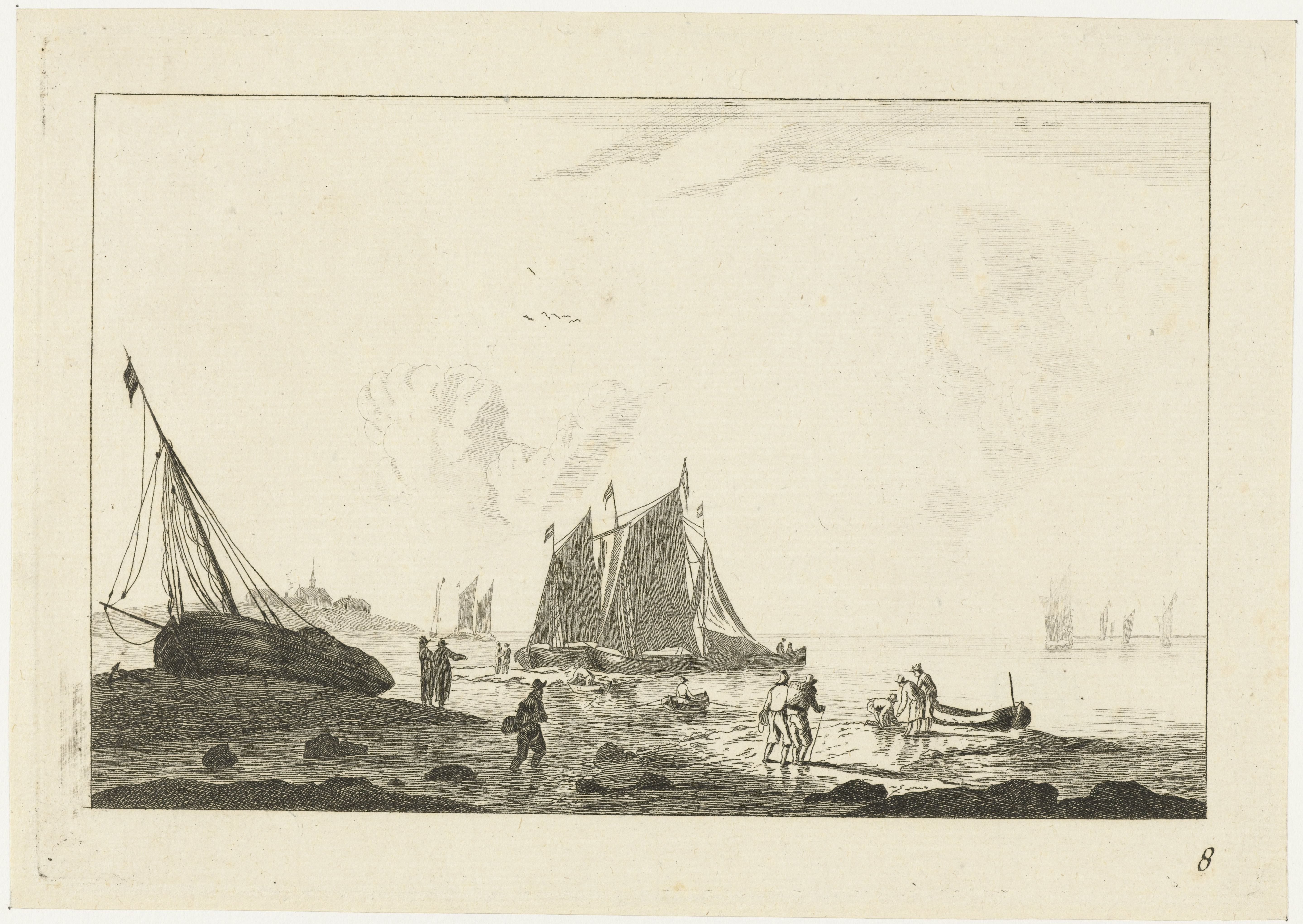Strand met een op het zand getrokken zeilschip