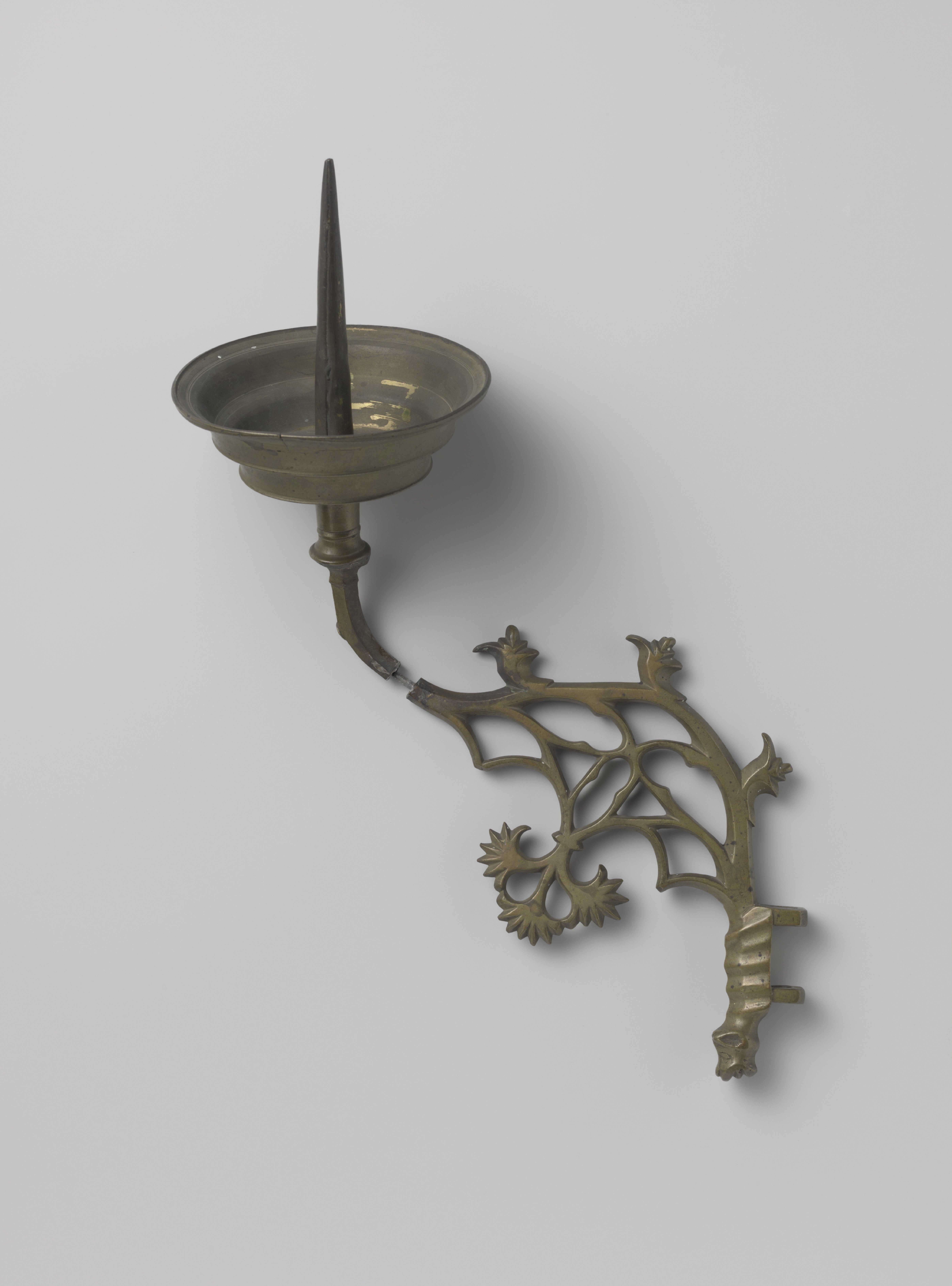 Wandarm van messing