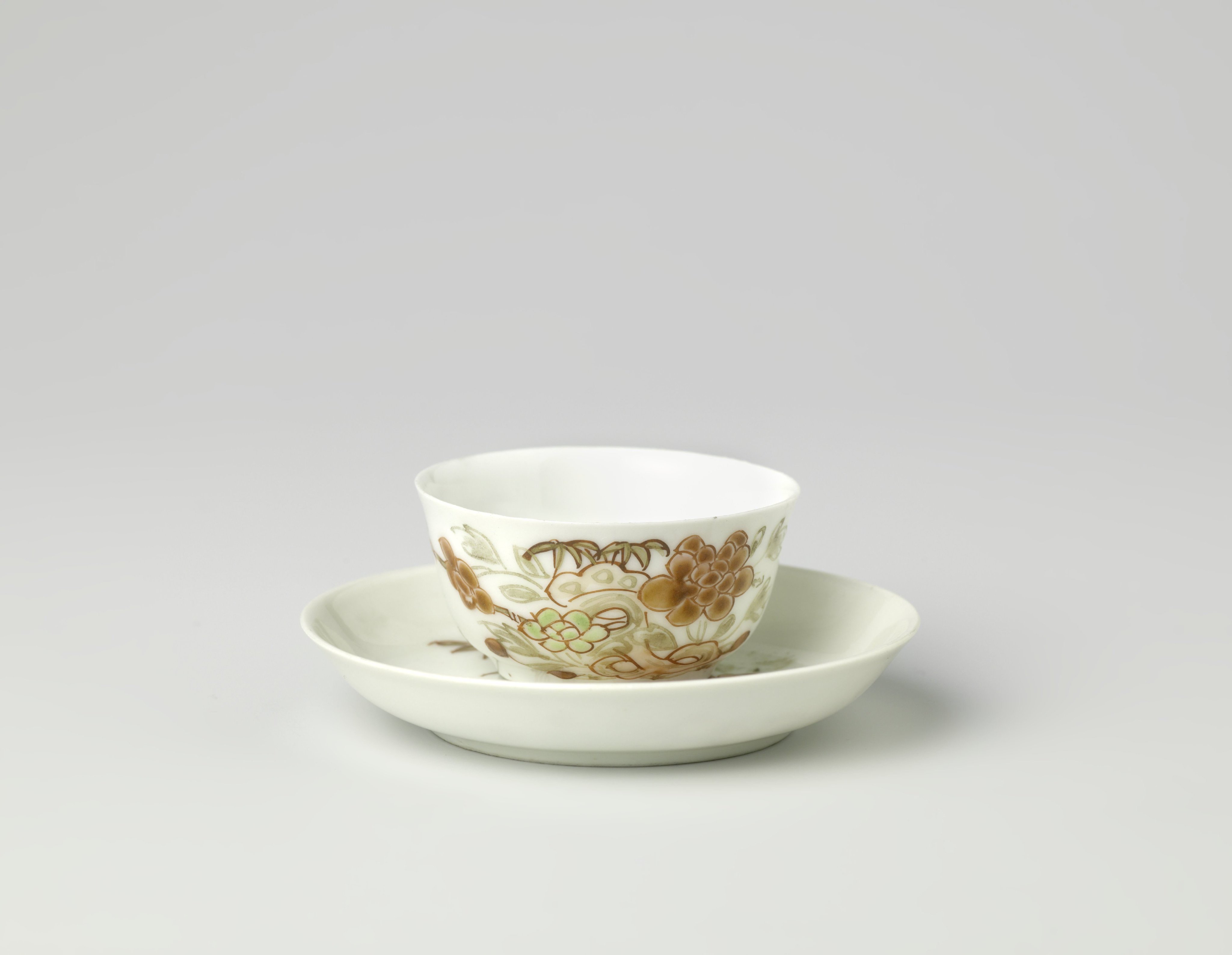 Cup and saucer with rock, peony and bamboo