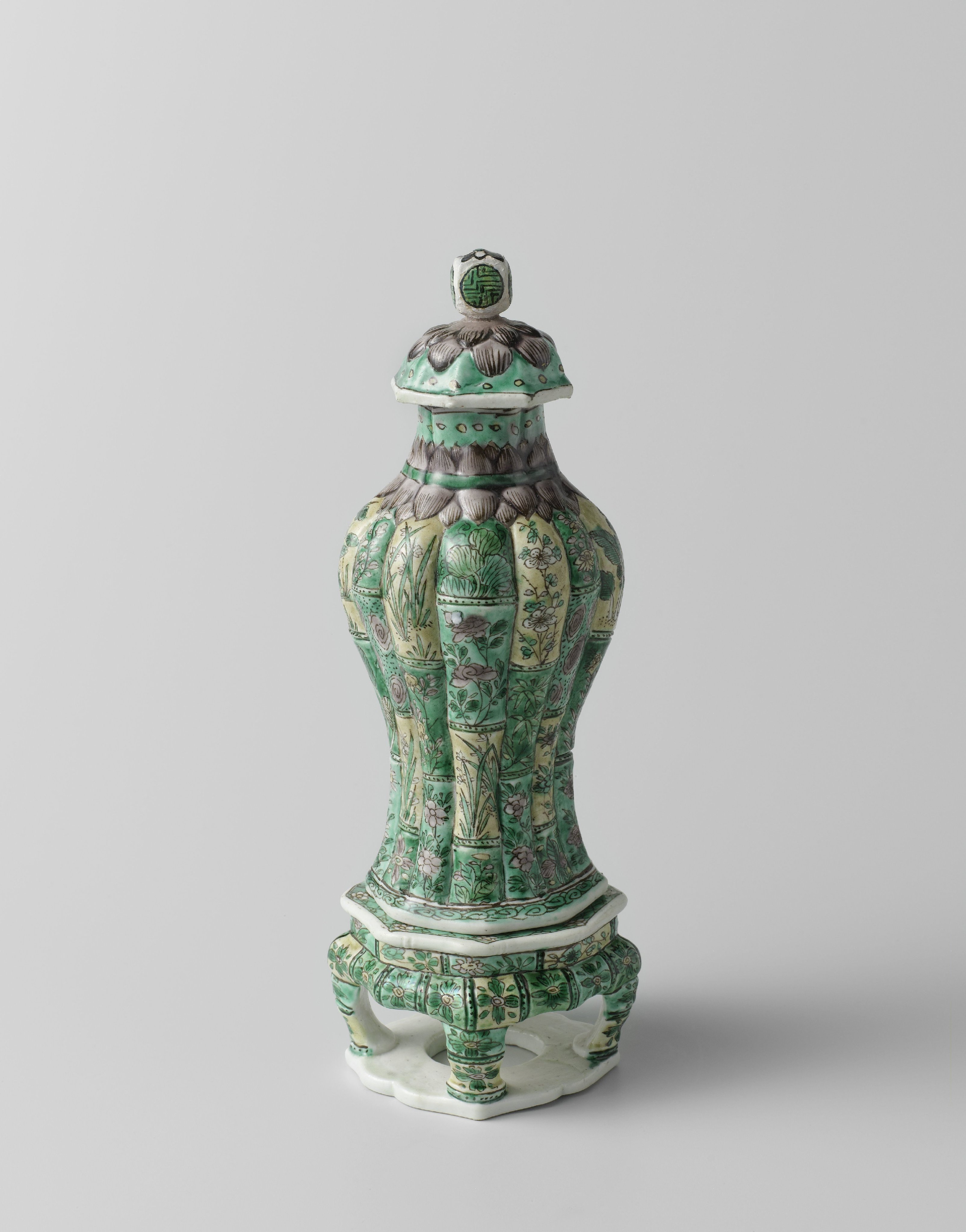 Covered vase with stand, modelled in bamboo-shaped sections with flower sprays