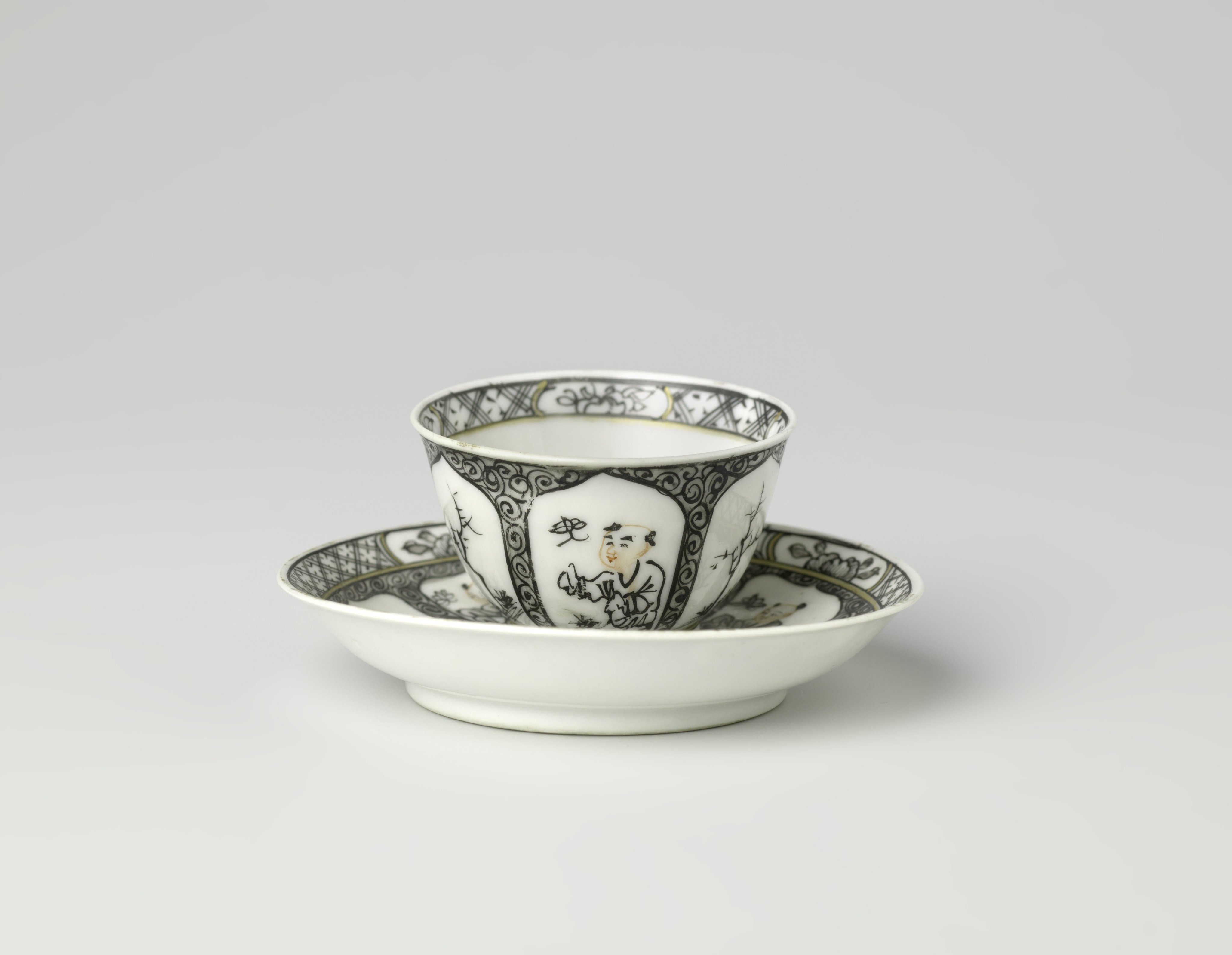 Cup and schotel with a boy and a butterfly in a landscape