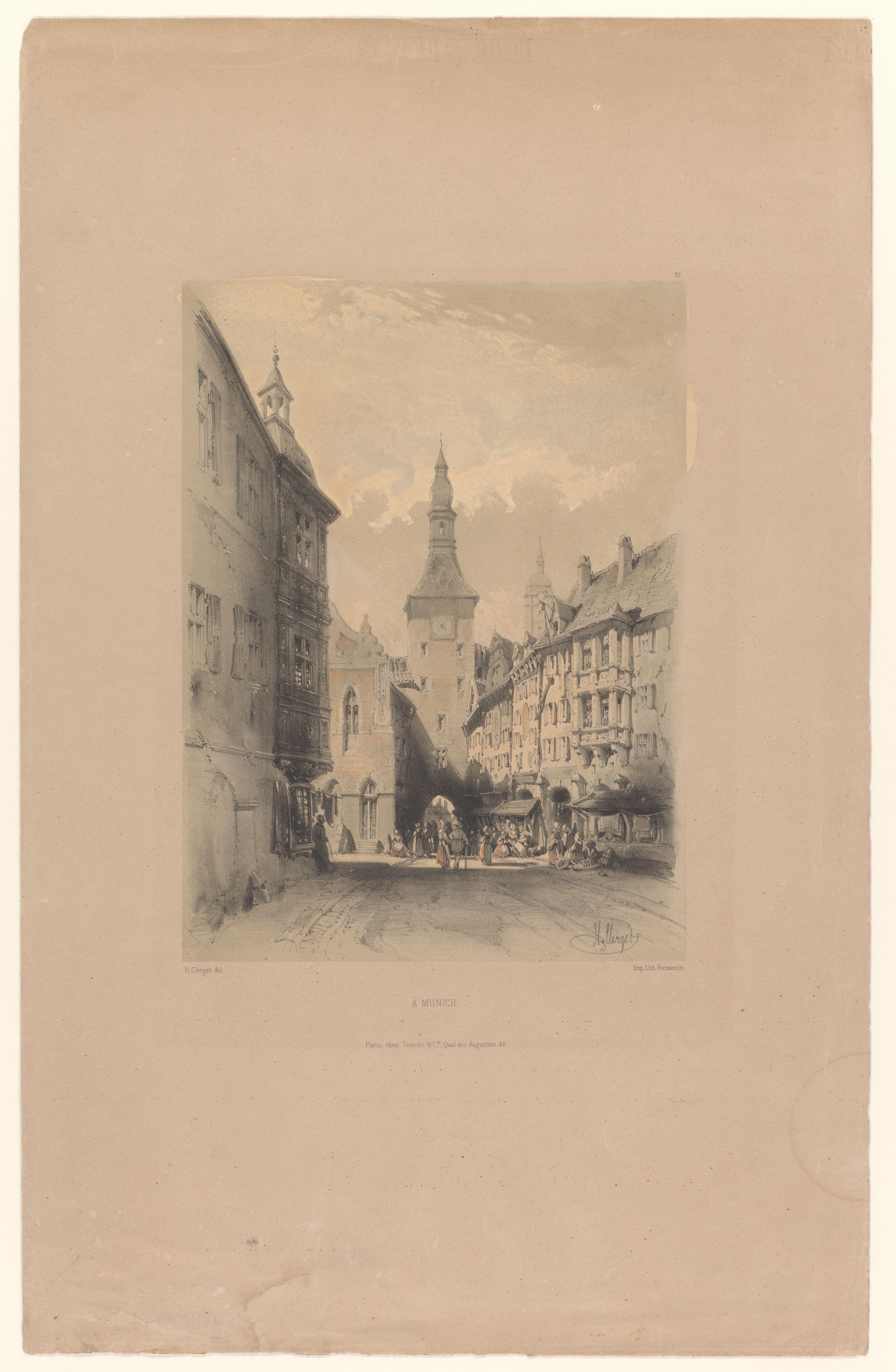 Zicht op een straat met kerktoren in München