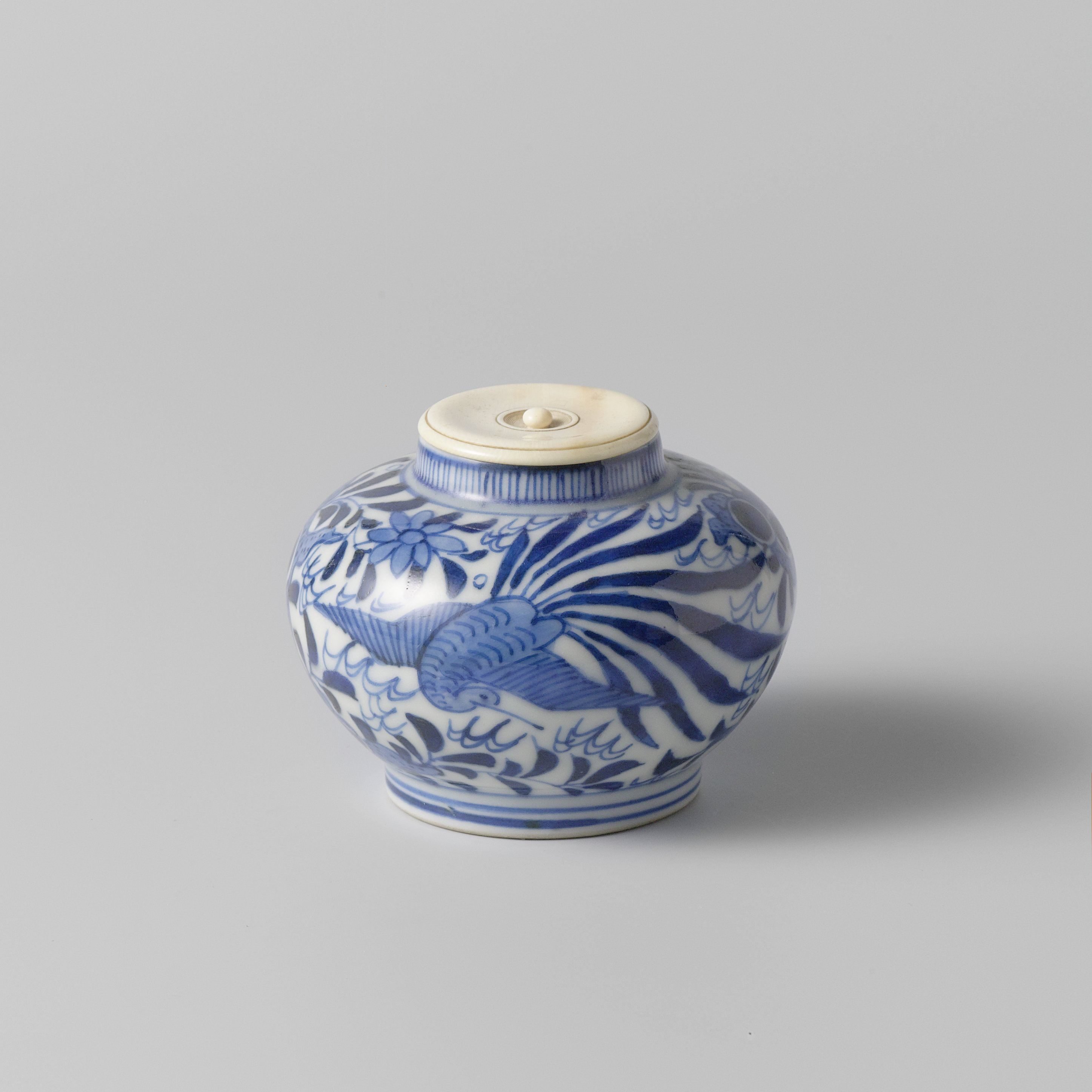 Tea caddy with hoo-birds among trees