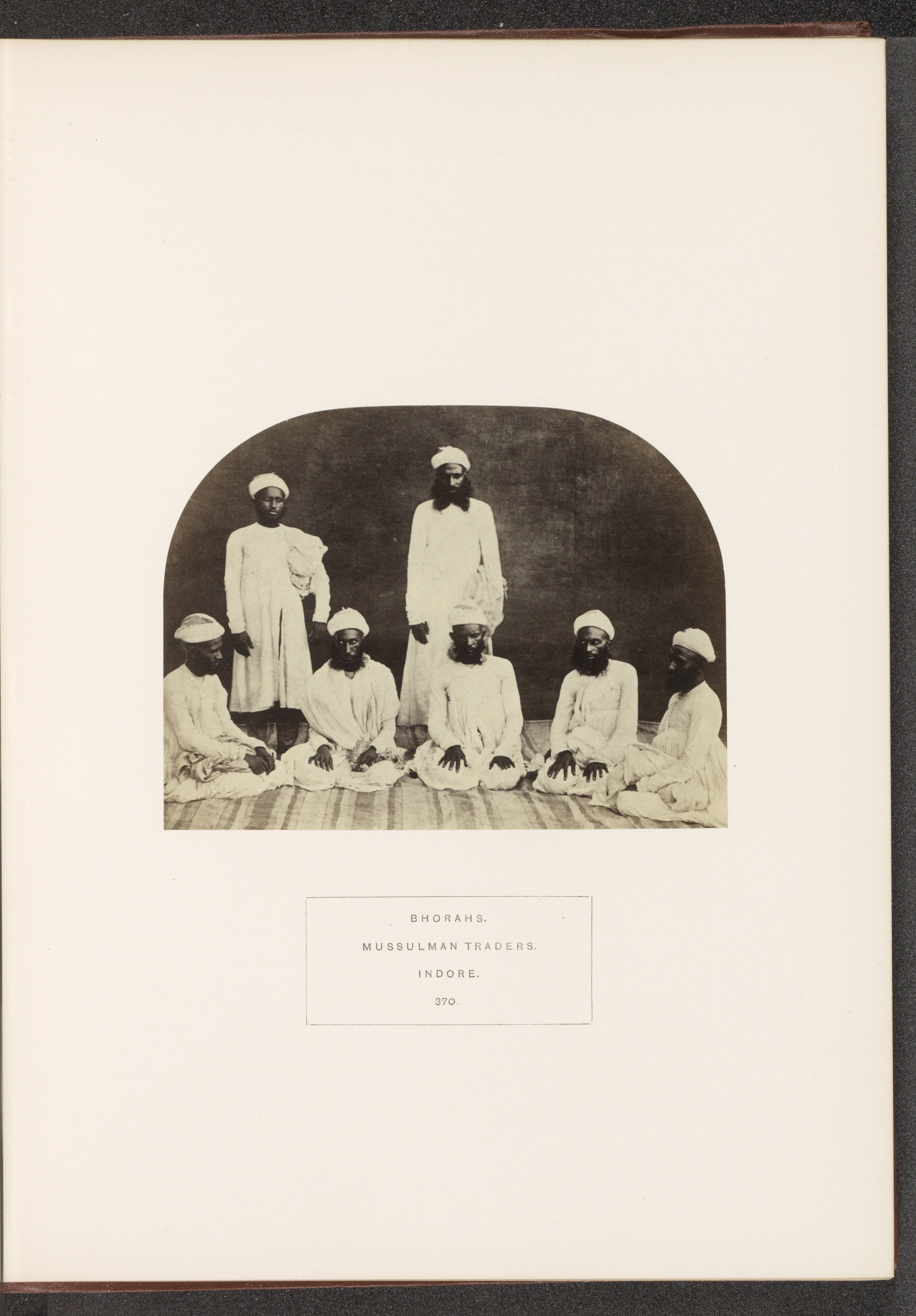 Portrait of seven unknown traders from the Bohra community of Indore, Madhya Pradesh, India