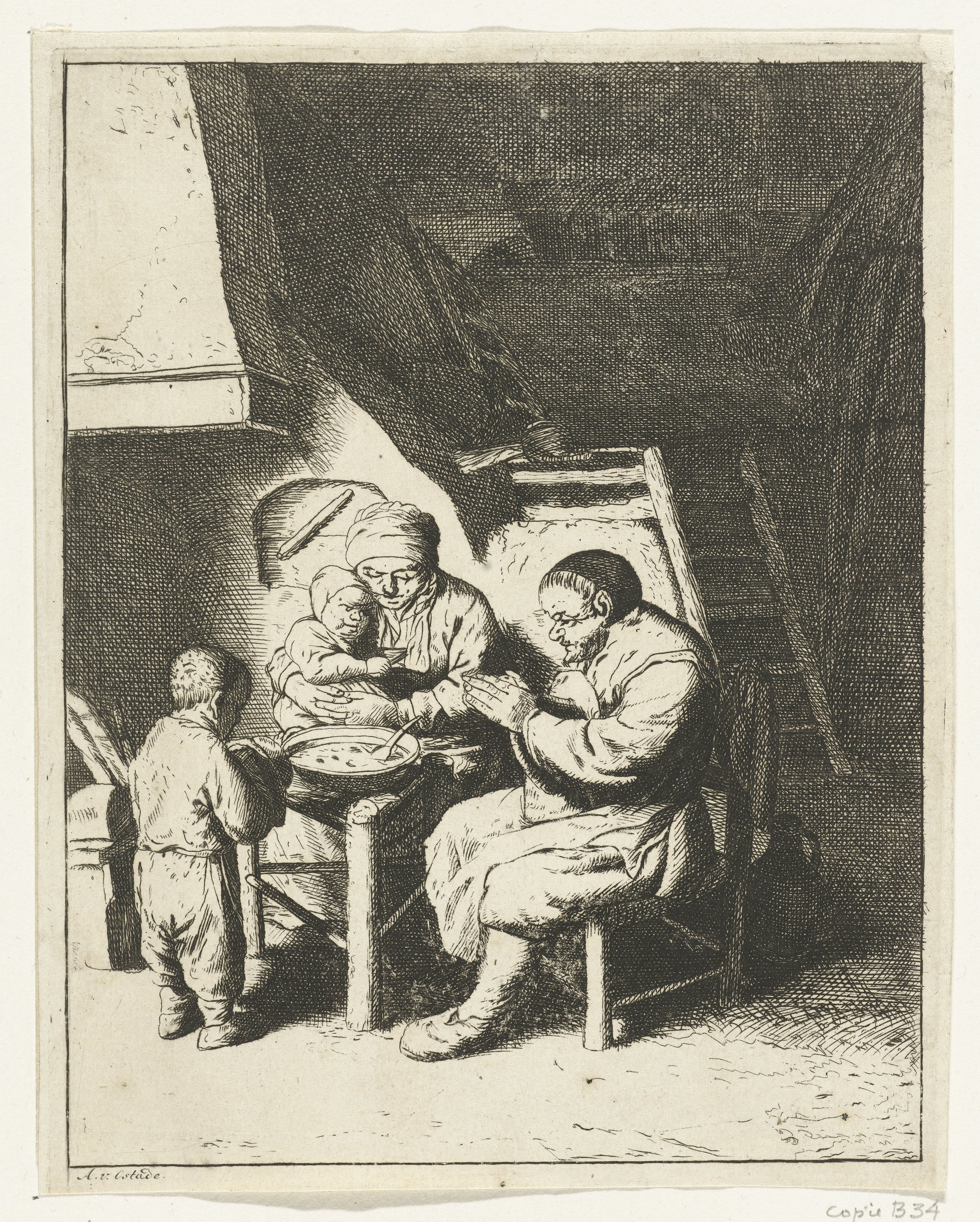Gezin aan tafel voor de maaltijd