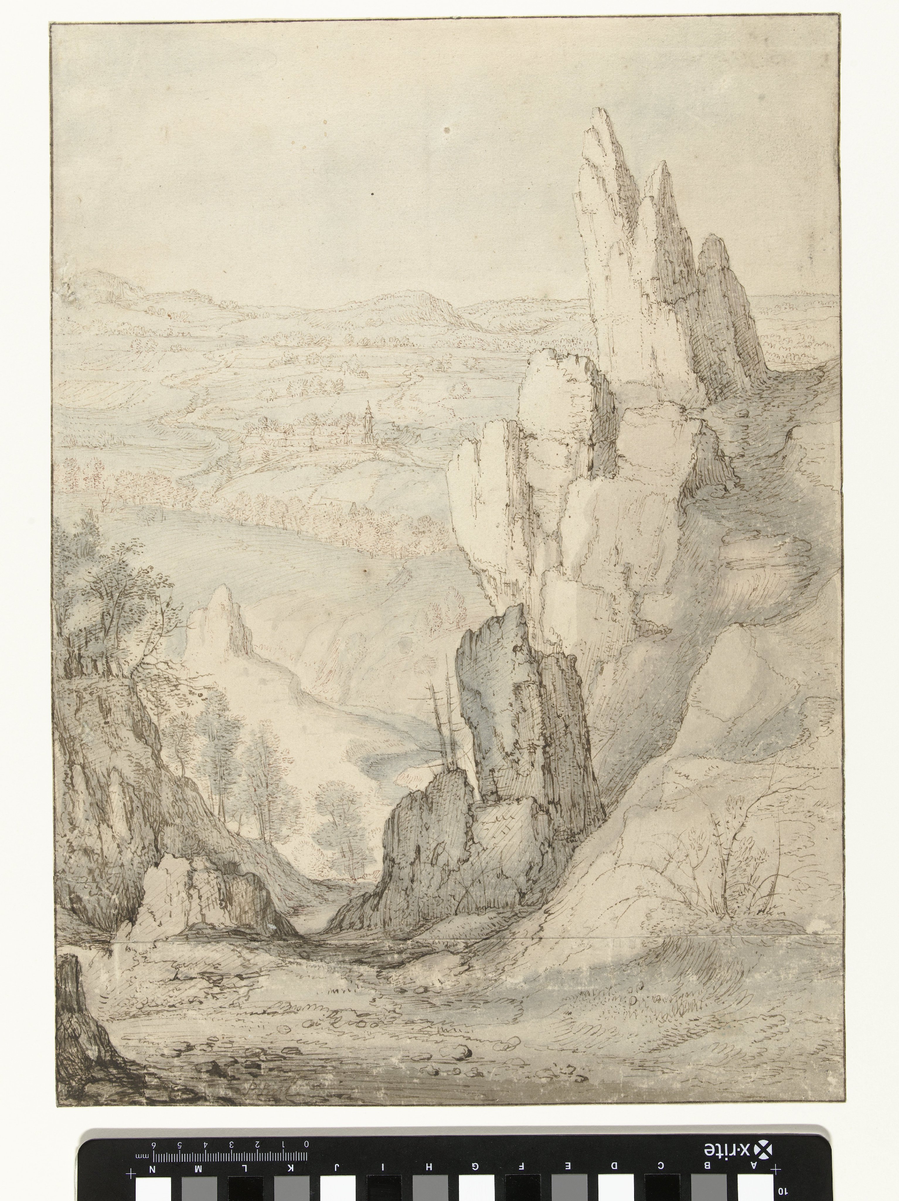 Heuvelachtig landschap met hoge rotsen