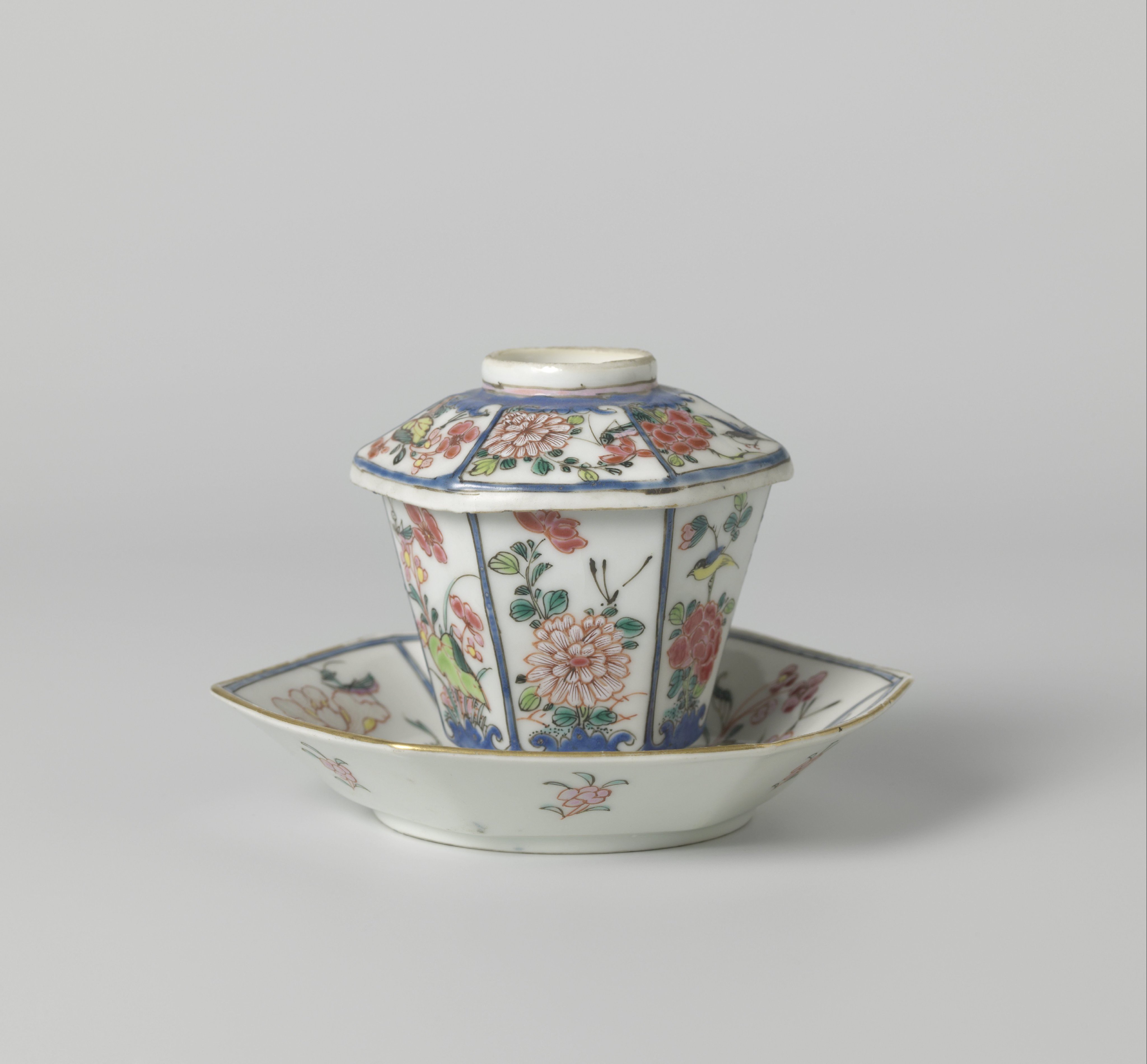 Hexagonal, covered cup and saucer with flower sprays, birds and insects
