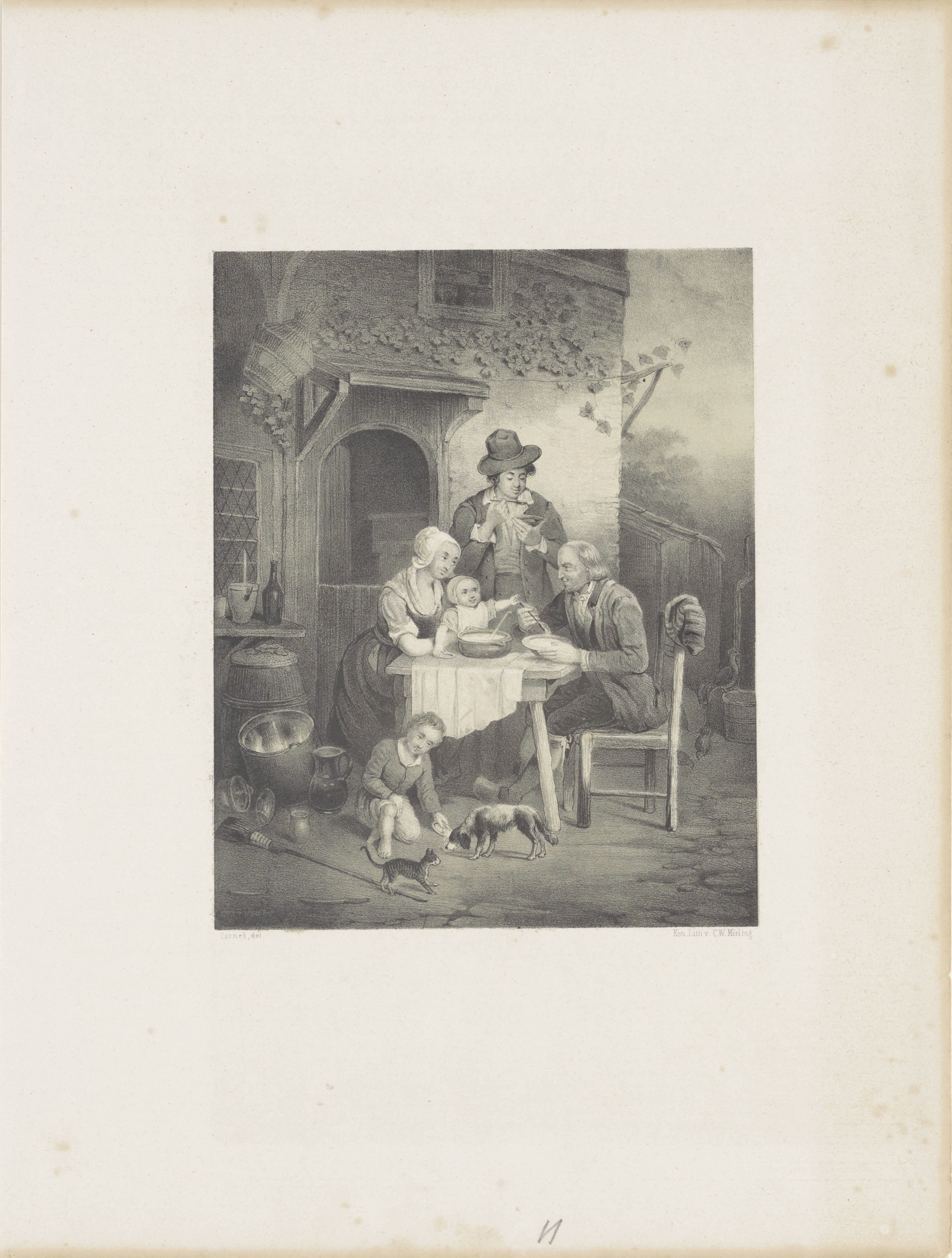 Familie buiten aan tafel