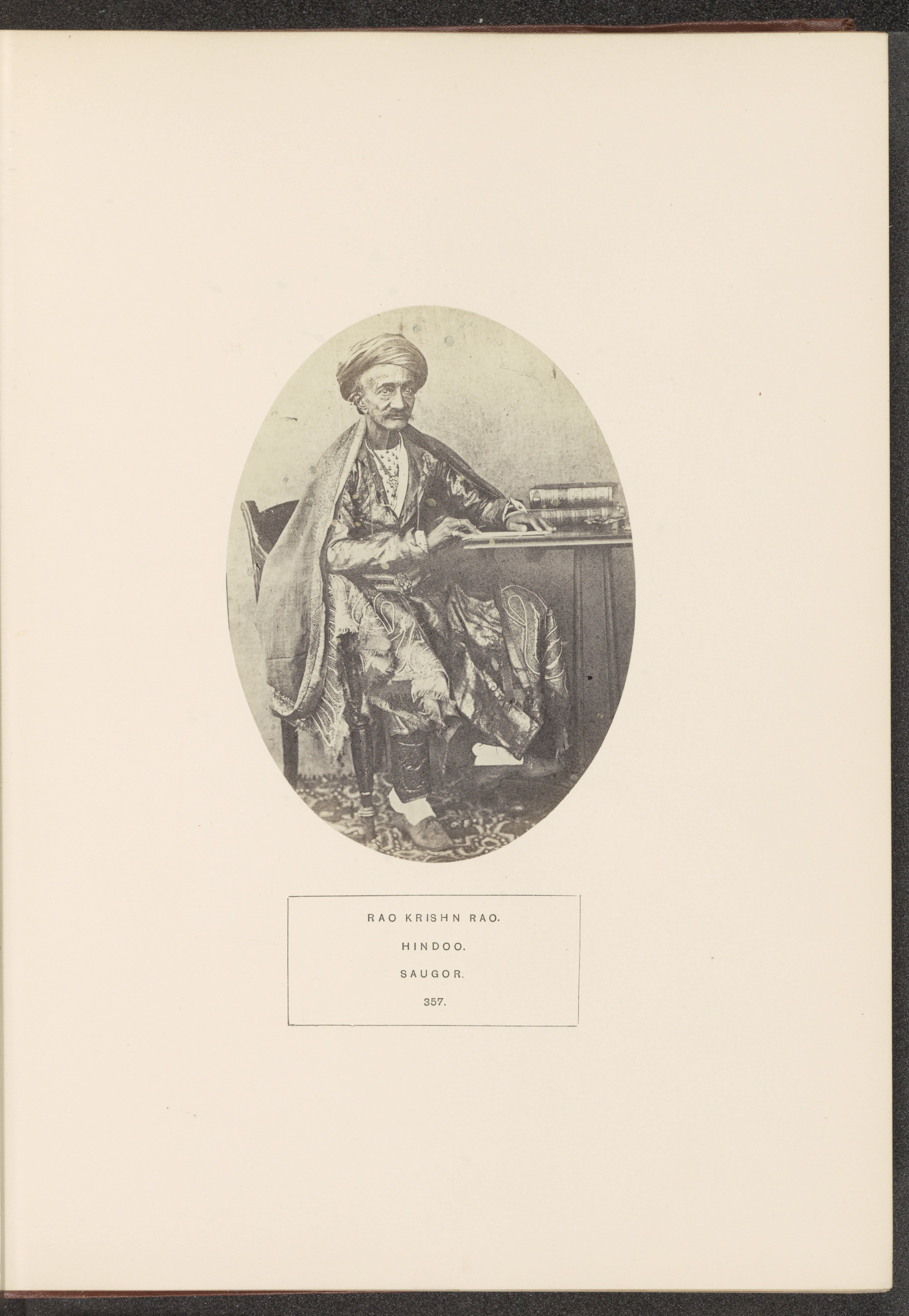 Portrait of Rao Krishn Rao, a pundit from Sagar at a reading table, Madhya Pradesh, India