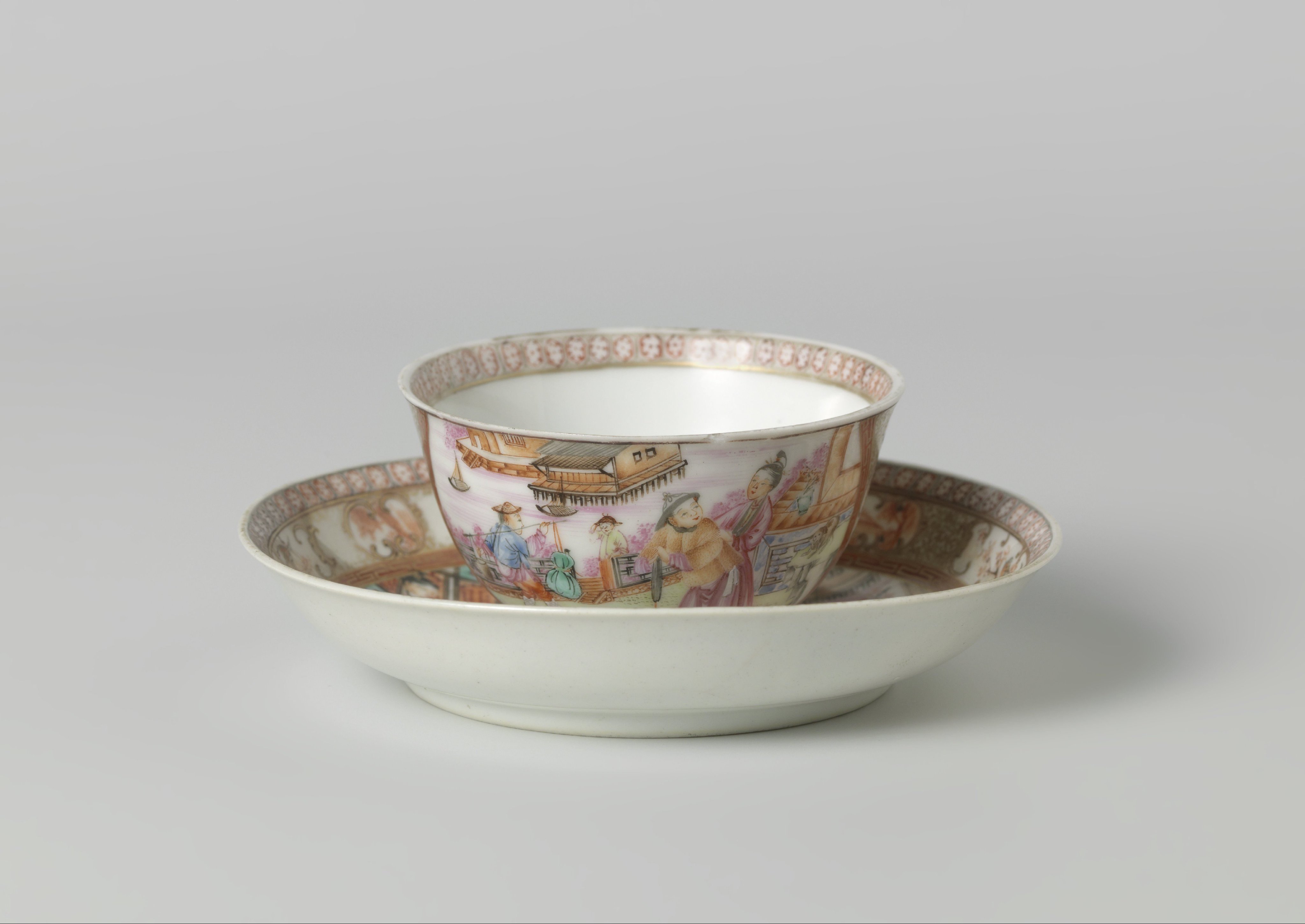 Bell-shaped cup and saucer with figuren and animals near pavilion at the waterside