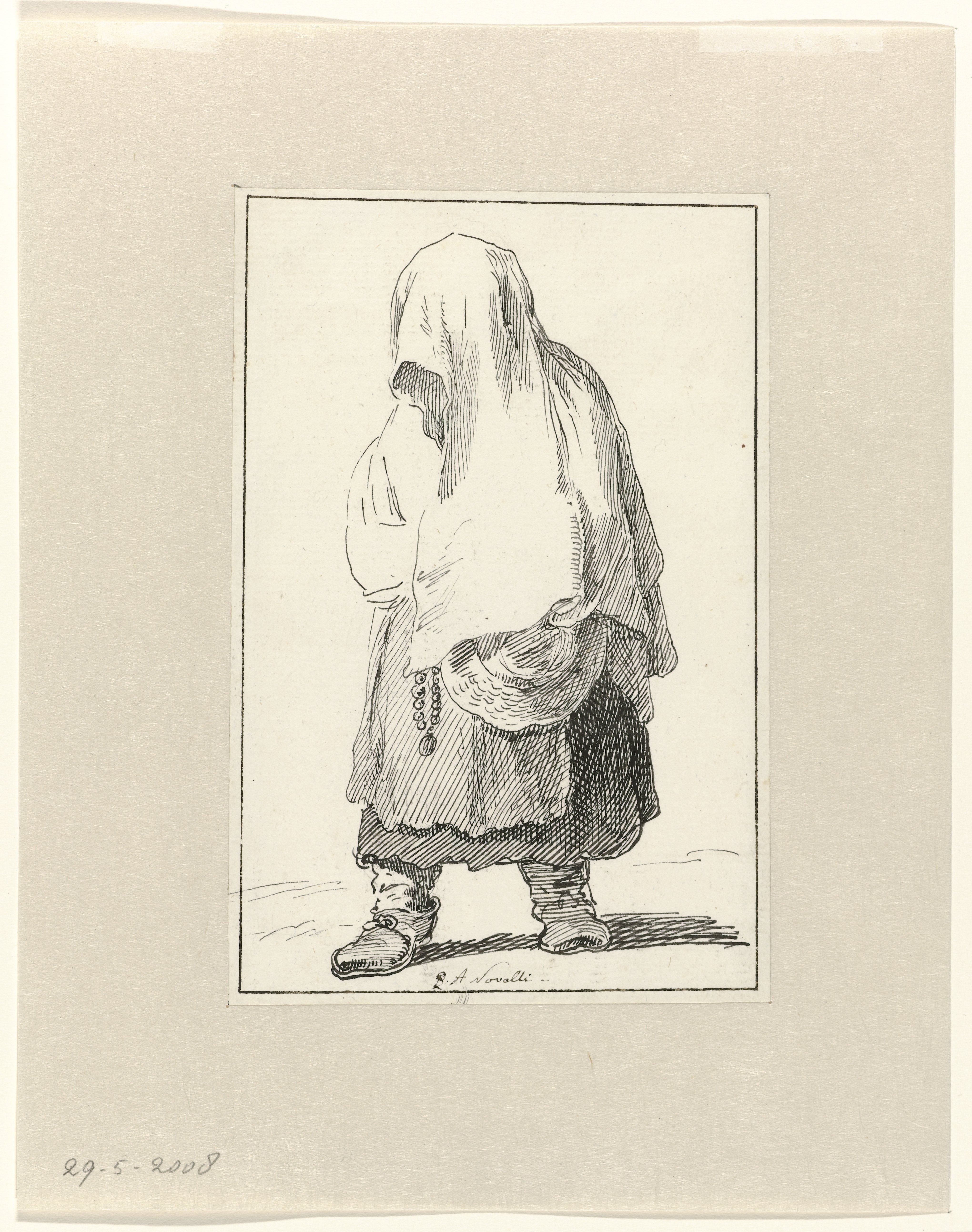 Een gesluierde vrouw met een rozenkrans in haar hand