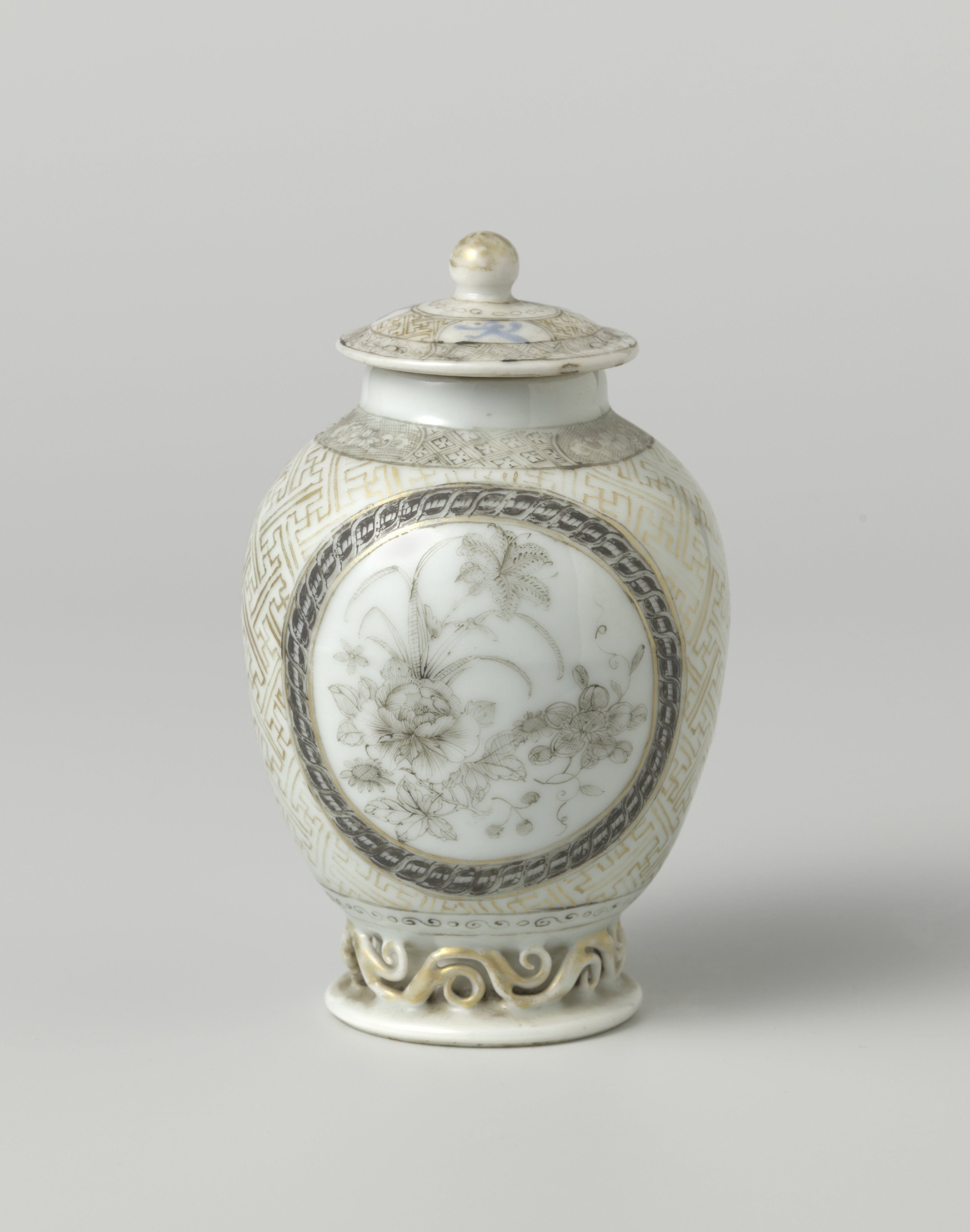 Ovoid tea caddy with flowering plants, swastika and diaper pattern