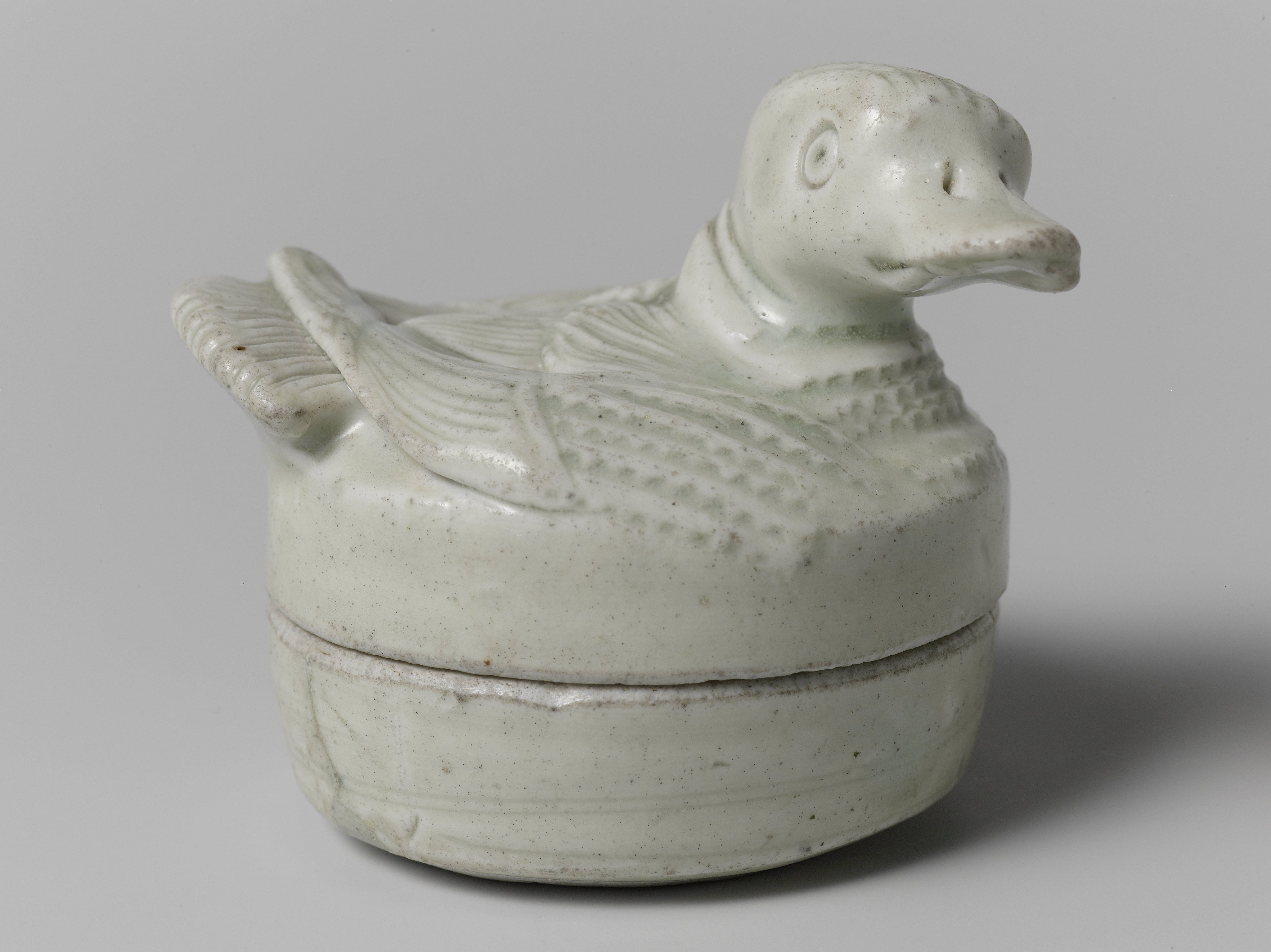 Container in the form of a bird