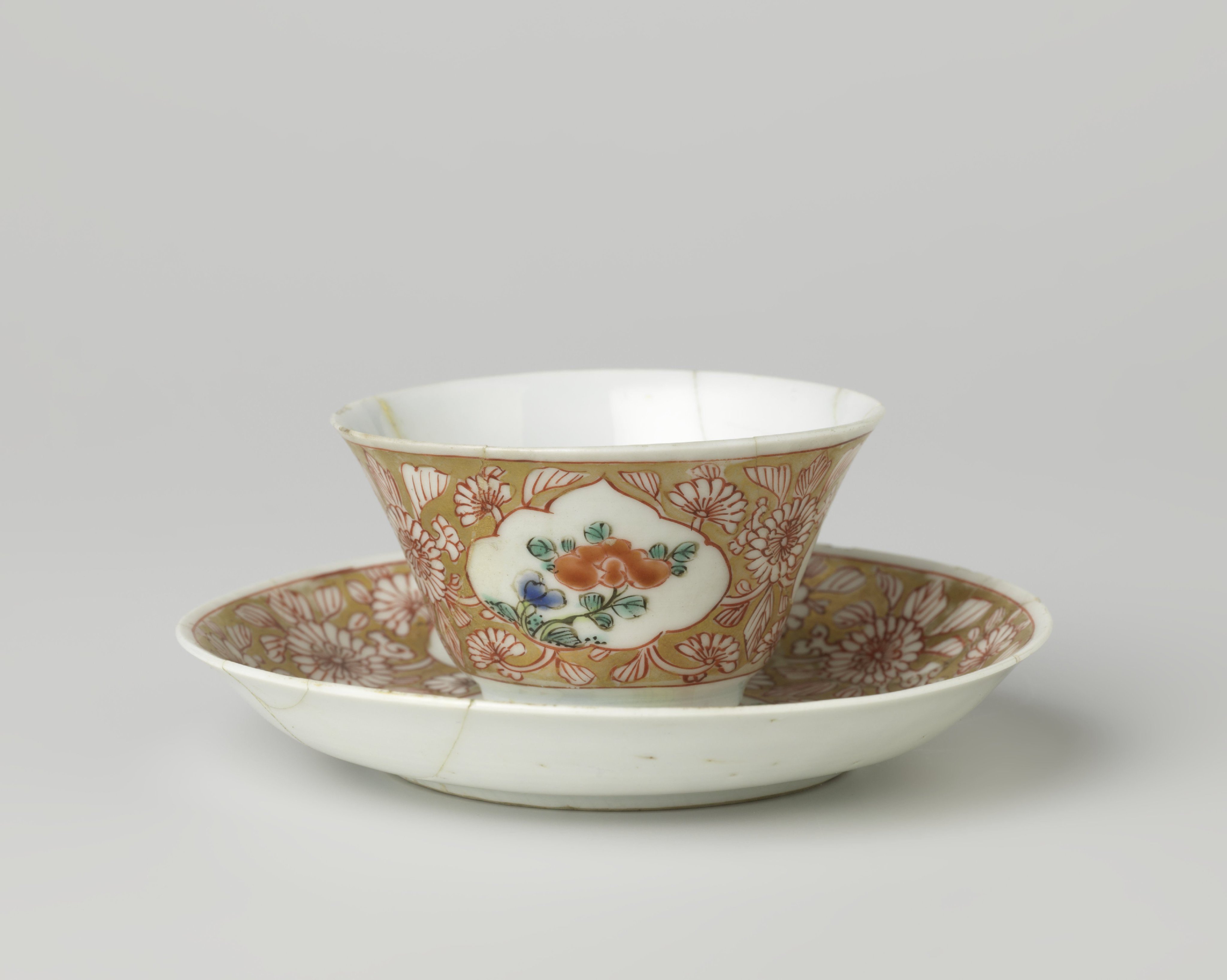 Cup and saucer with a woman with flower basket and flowering plants in panels