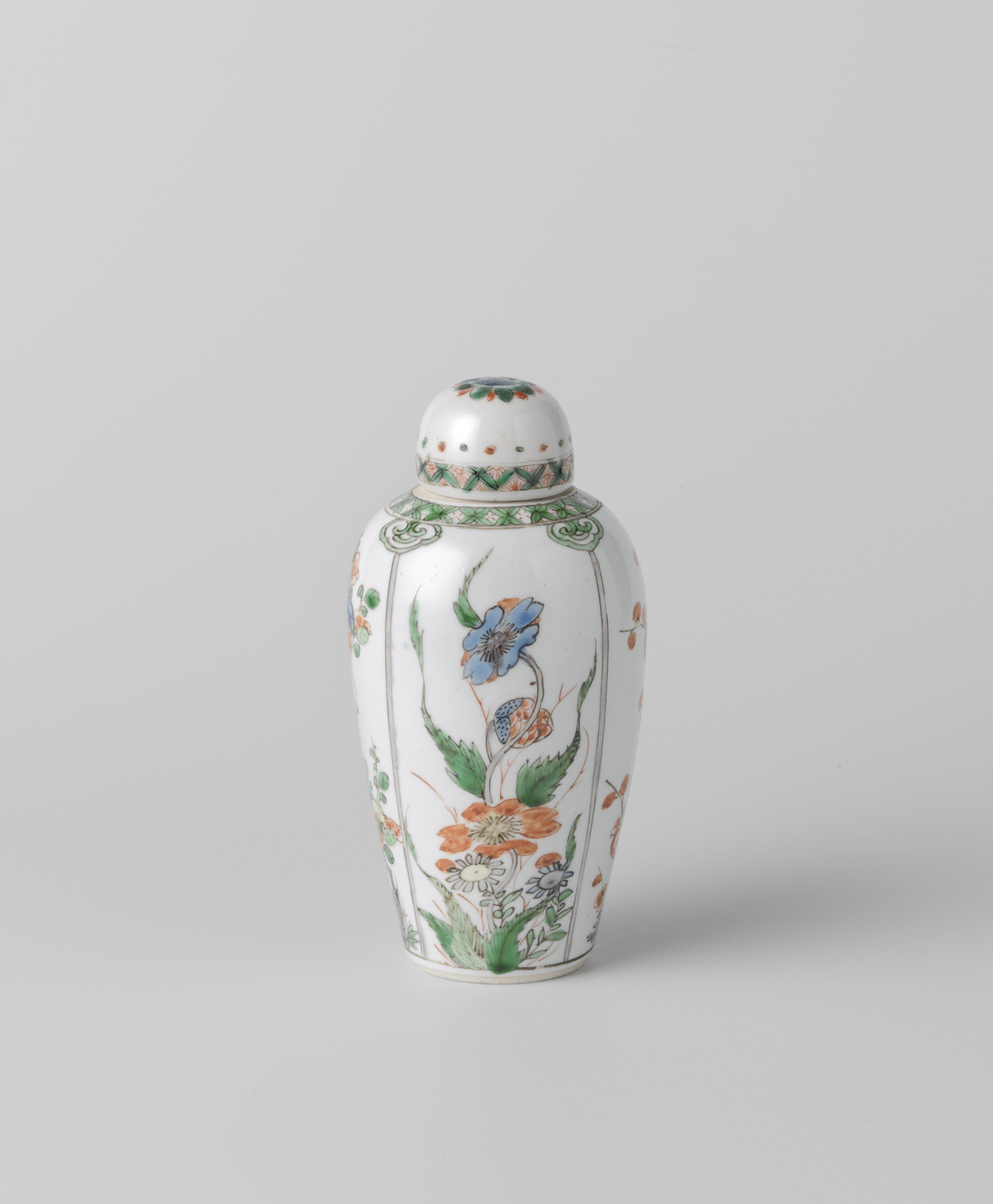 Ovoid covered jar with flowering plants in panels