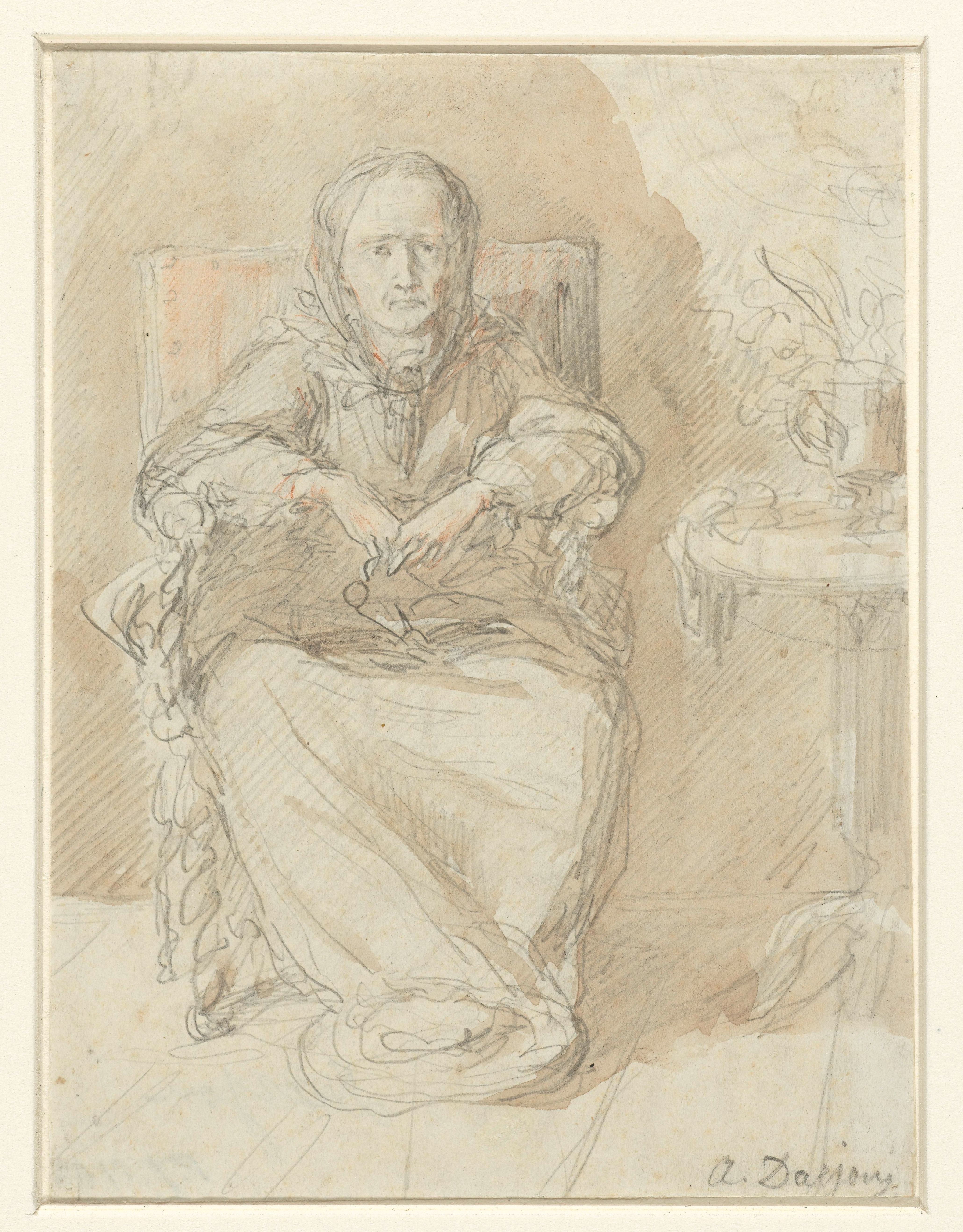 Zittende oude dame naast een tafel