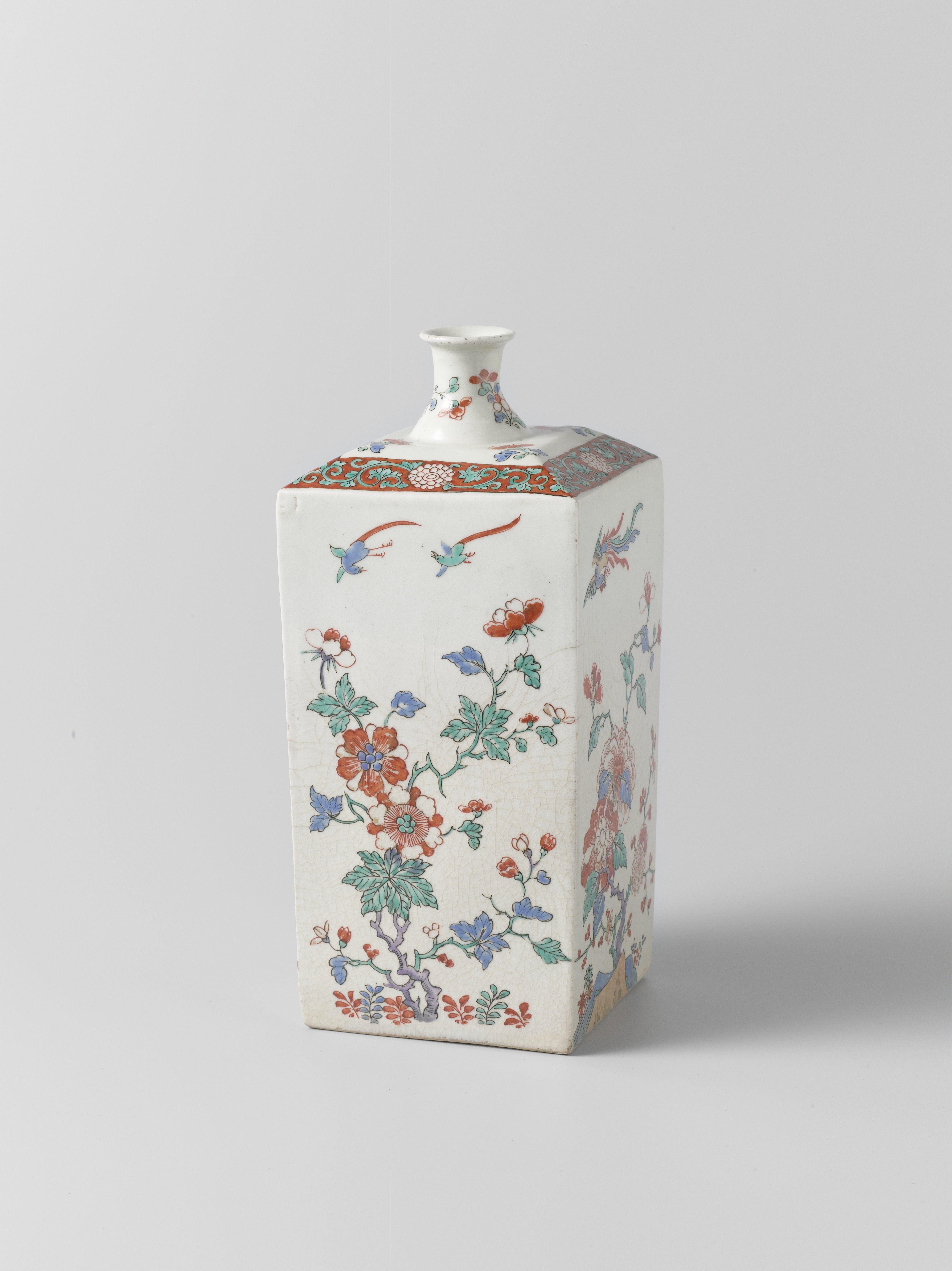 Square bottle with flowering plants and birds