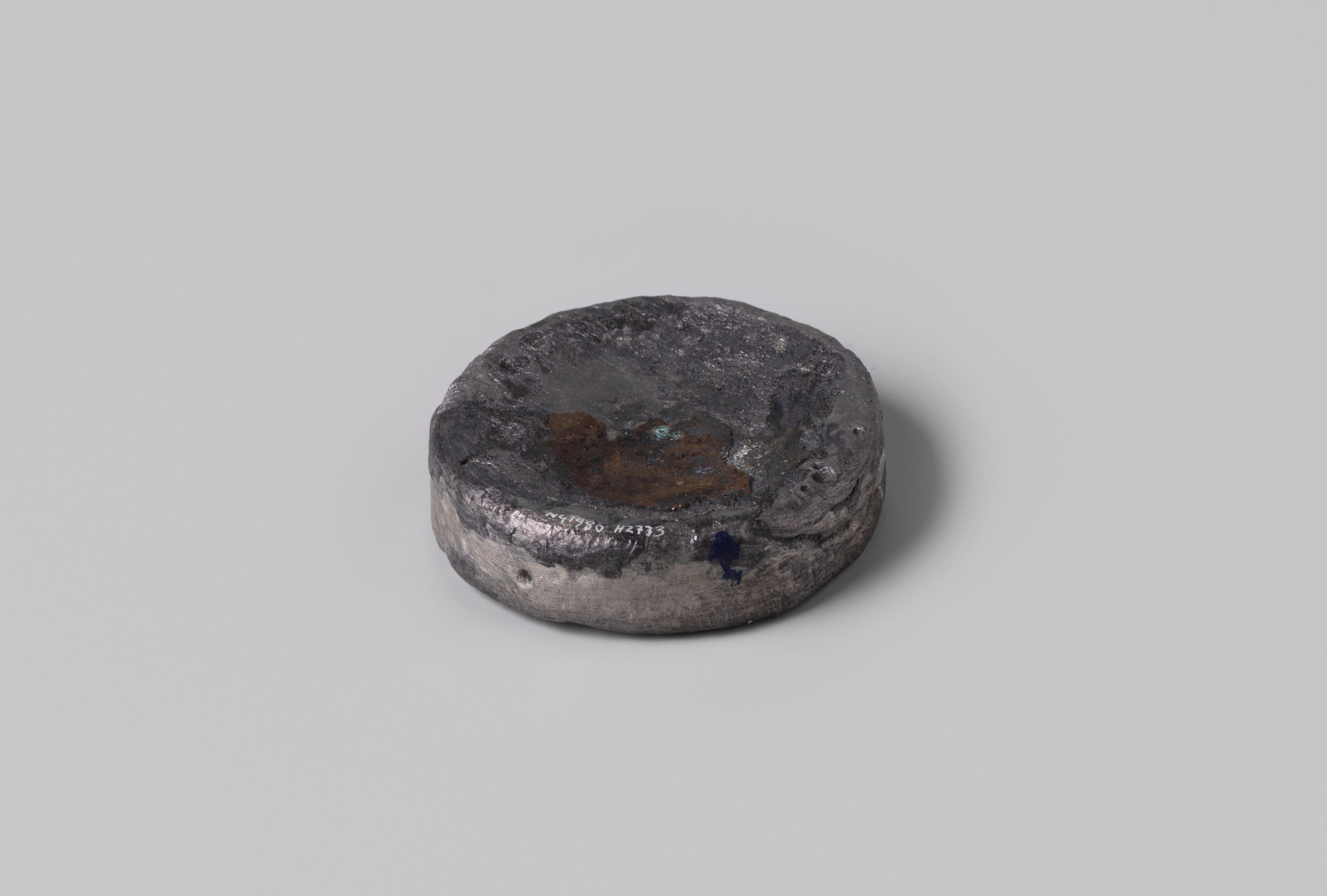 Disc-shaped weight, lead, from the wreck of the Dutch East India ship Hollandia