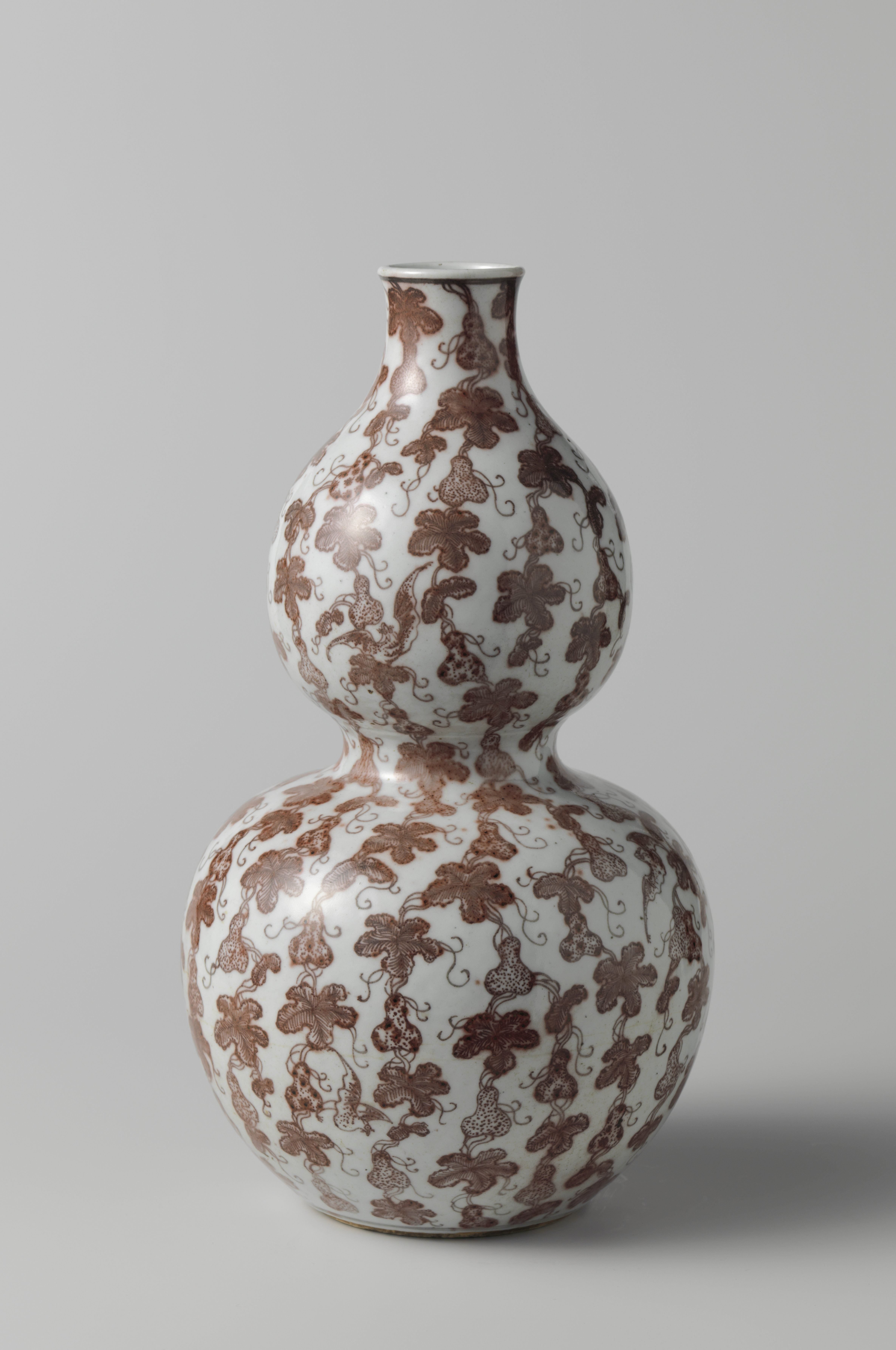 Double gourd vase with bats, gourds, leaves and tendrils