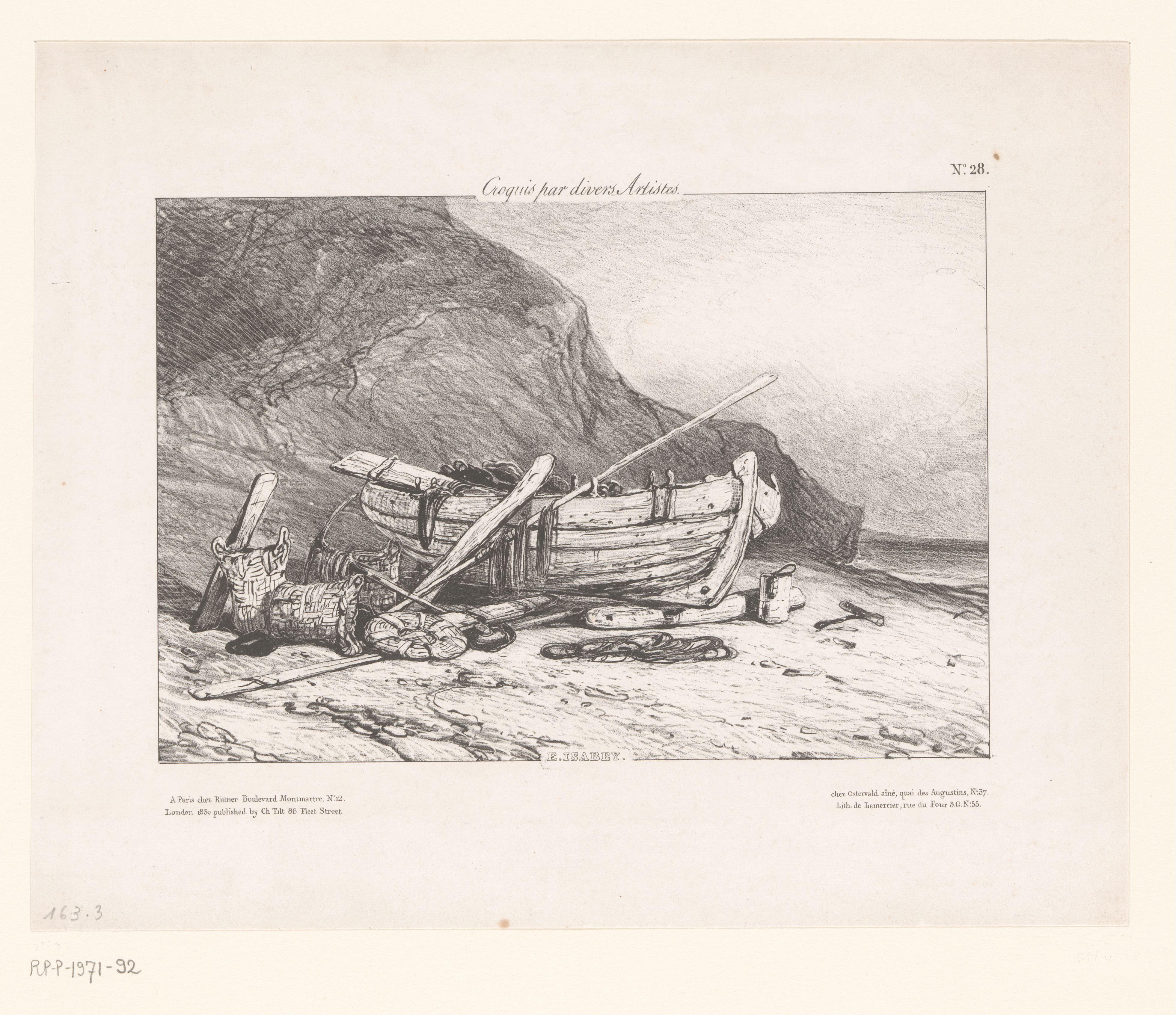 Visserssloep op het strand aan de voet van een klif