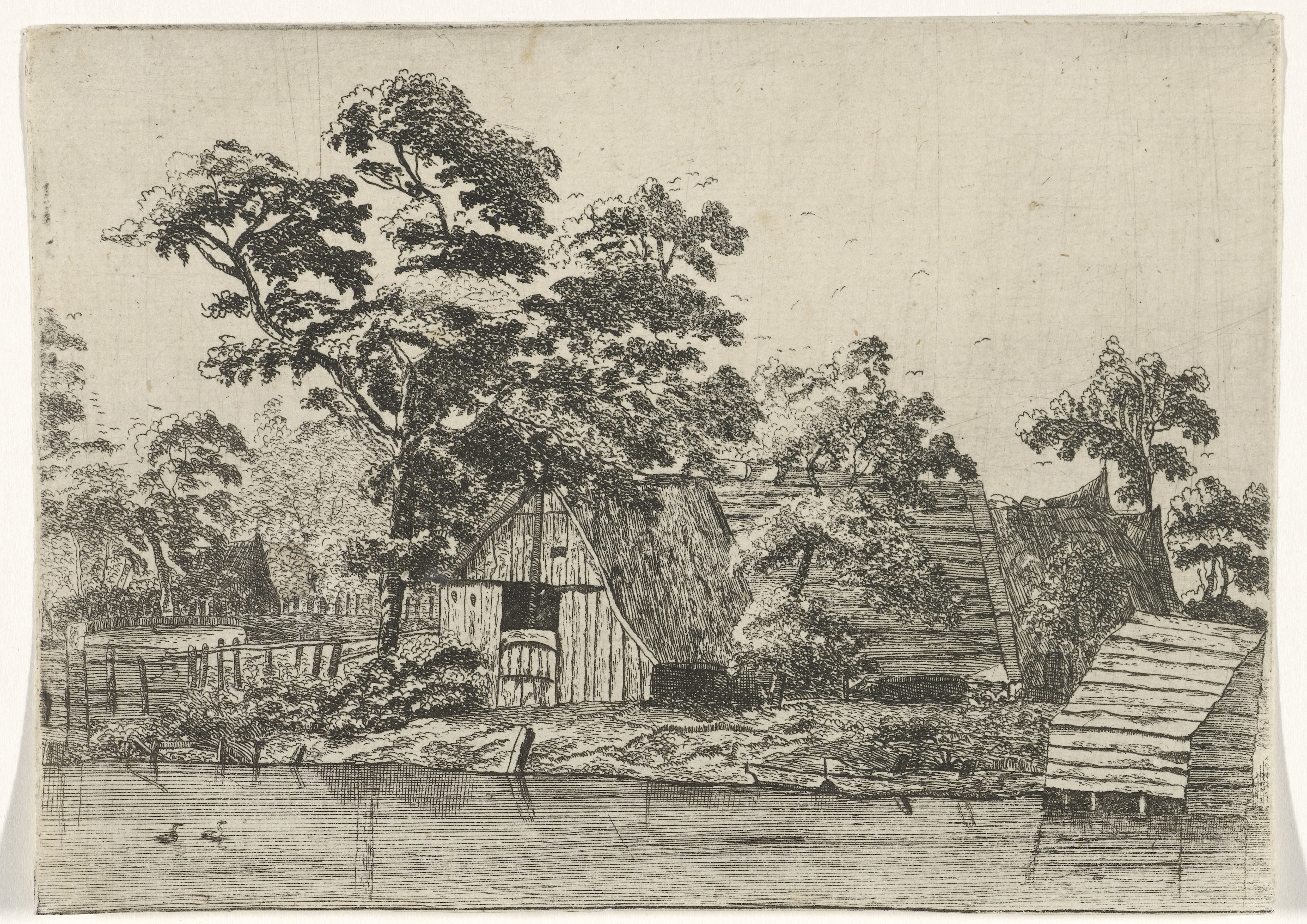 Huizen aan een vijver