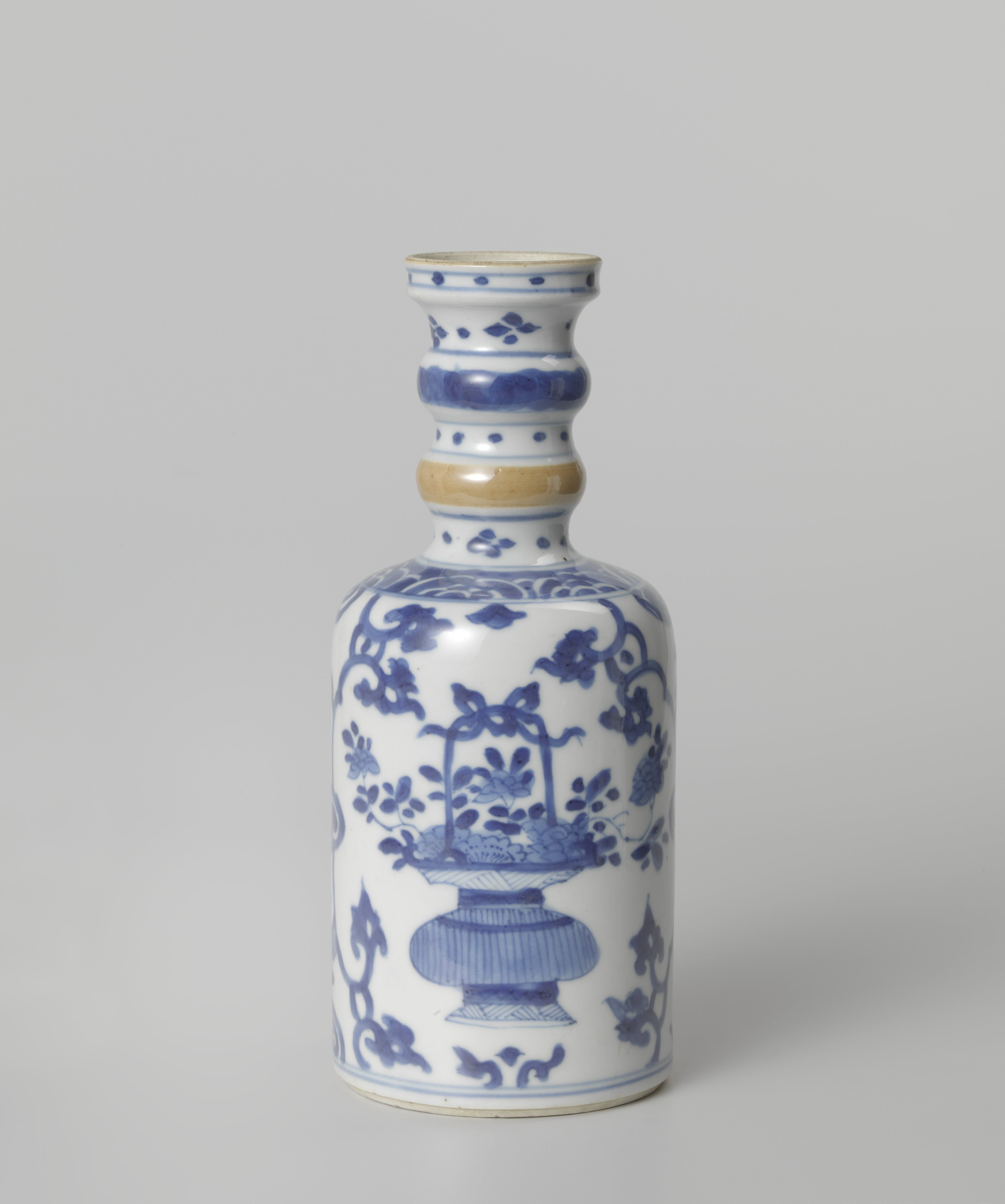 Bottle vase with flower baskets and floral scrolls