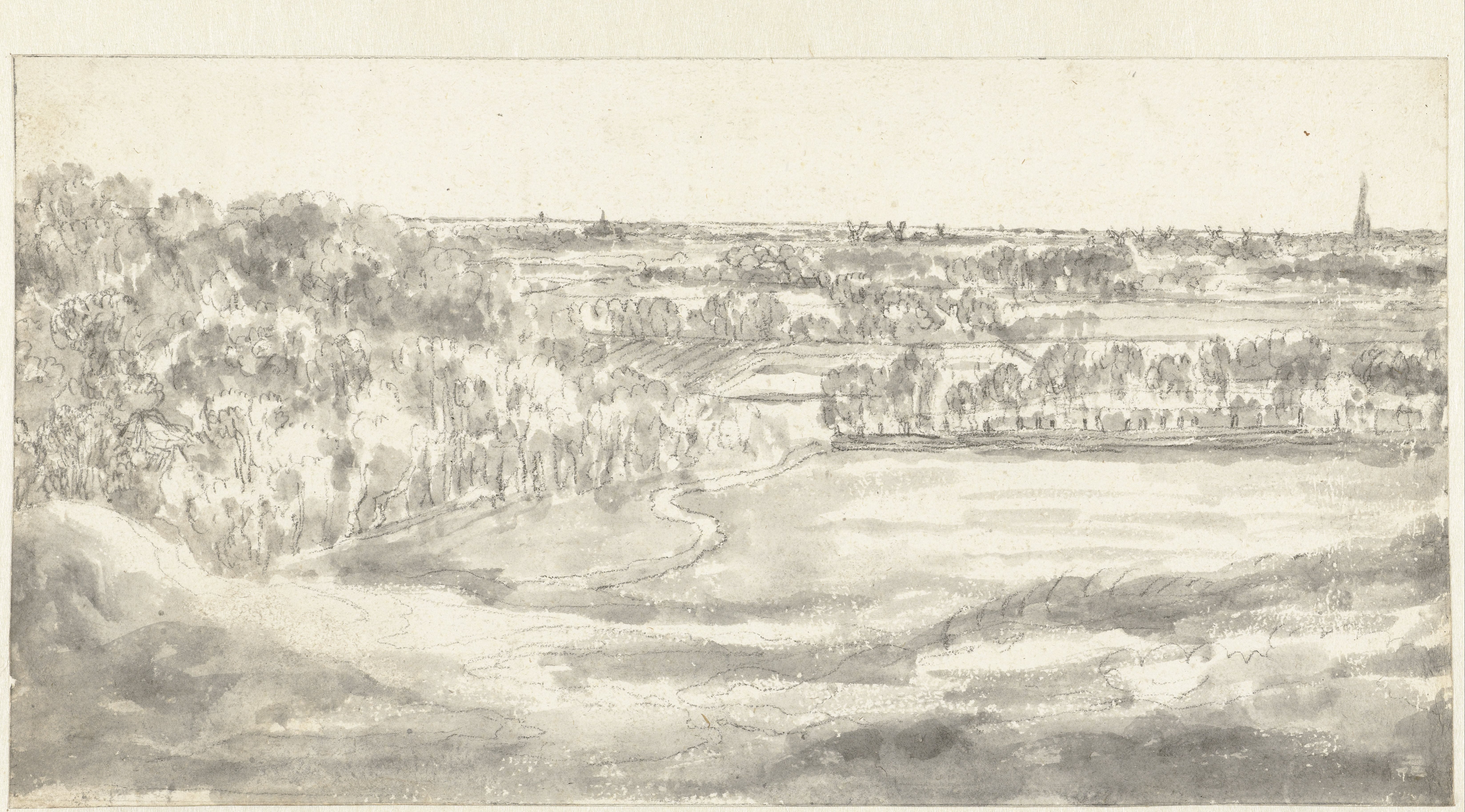 Uitgestrekt landschap gezien vanaf een heuvel
