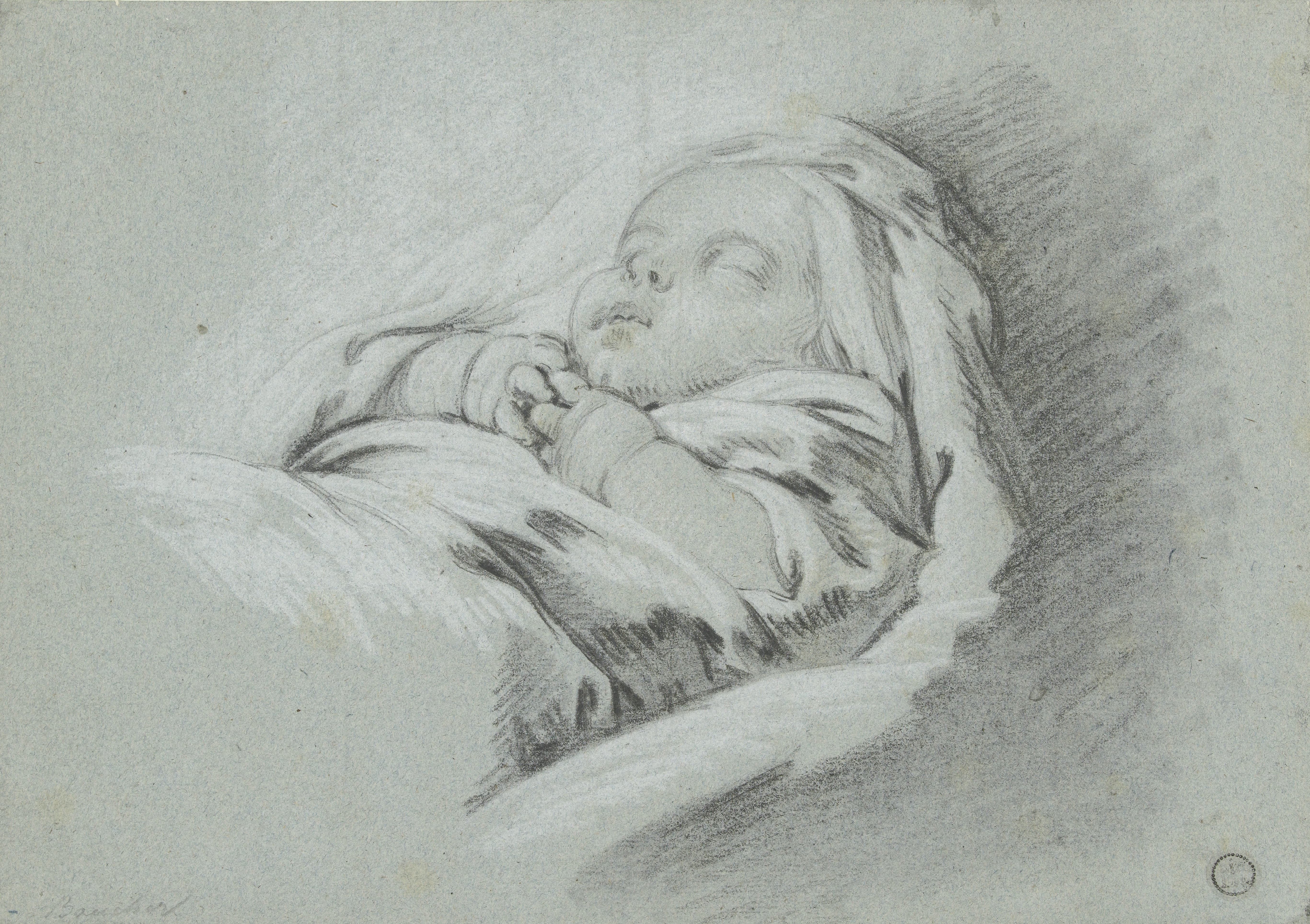 Slapende baby, de handjes over elkaar