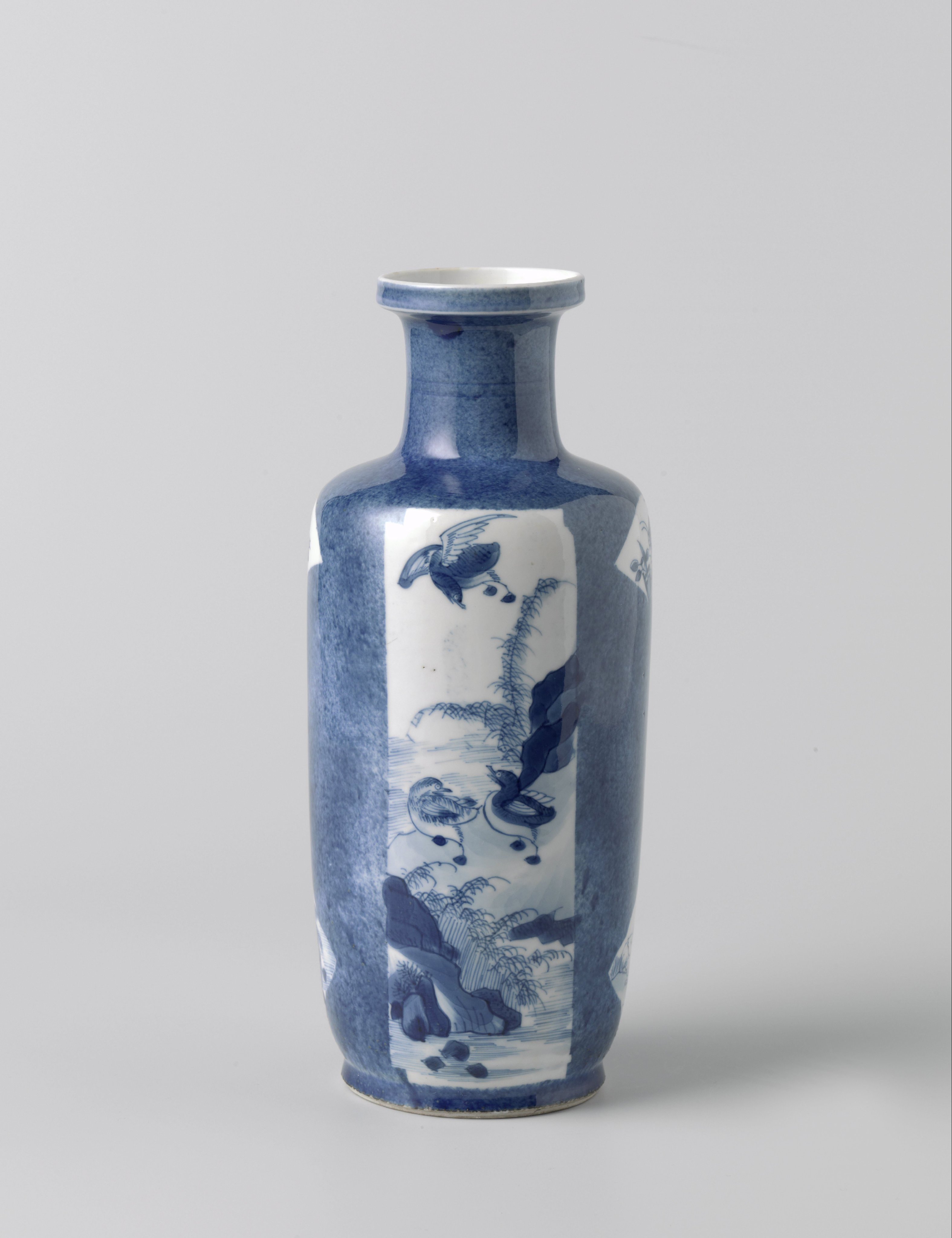 Cilindrical vase with powder blue and panels with figures and animals in landscapes