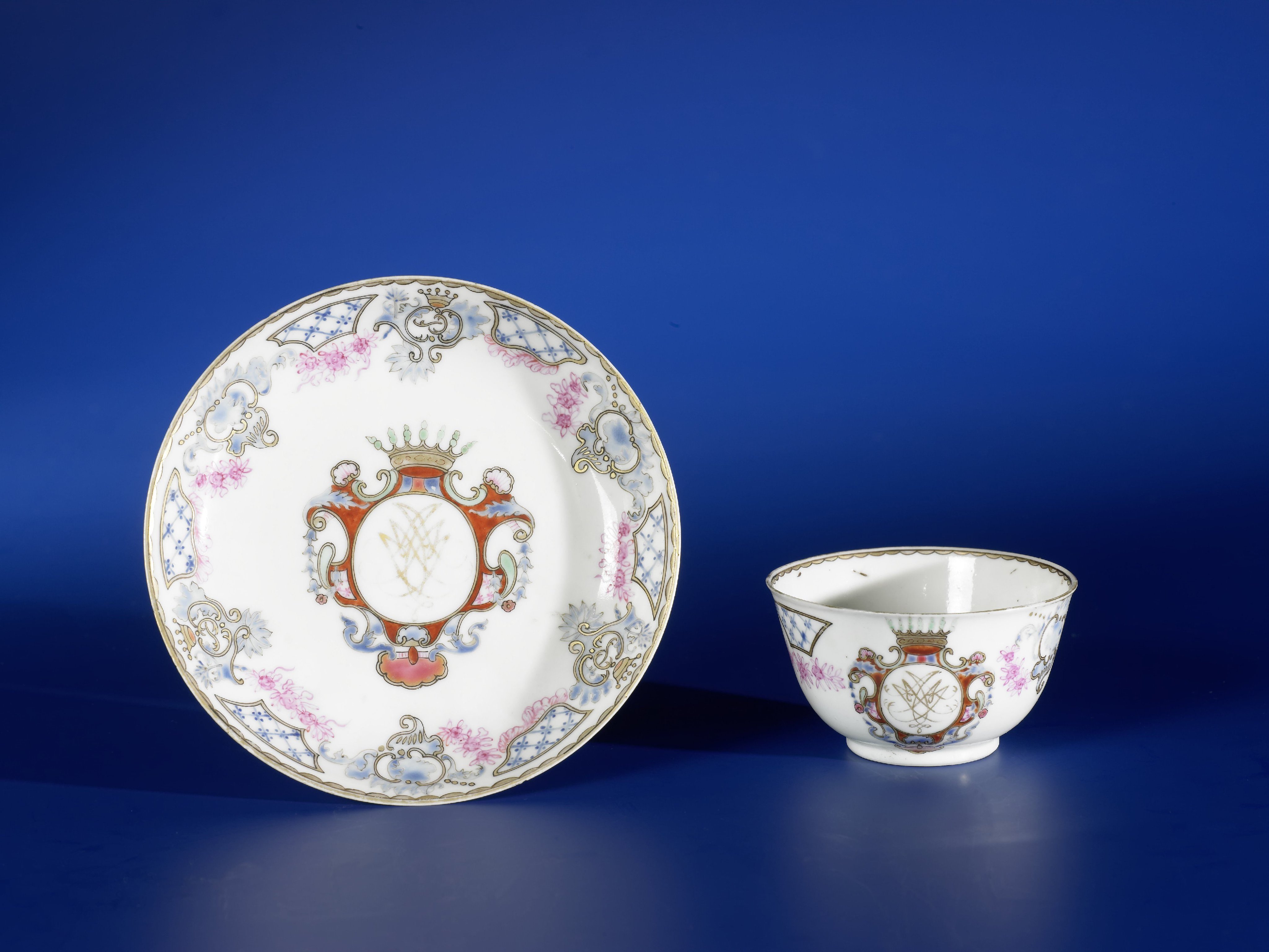 Bell-shaped cup and saucer with a crowned monogram