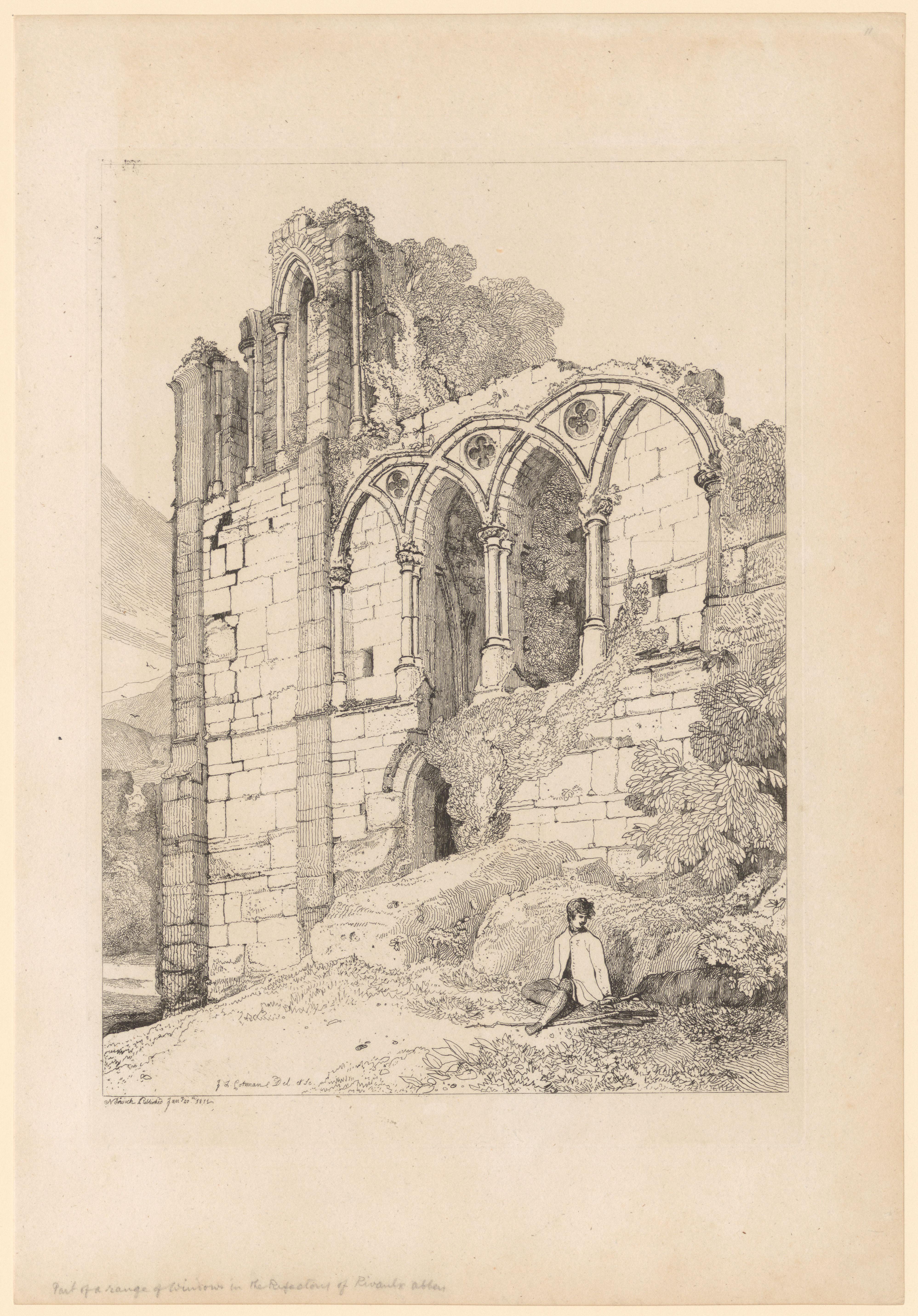 Man zit onder een venster van de ruïne van de Abdij van Rievaulx
