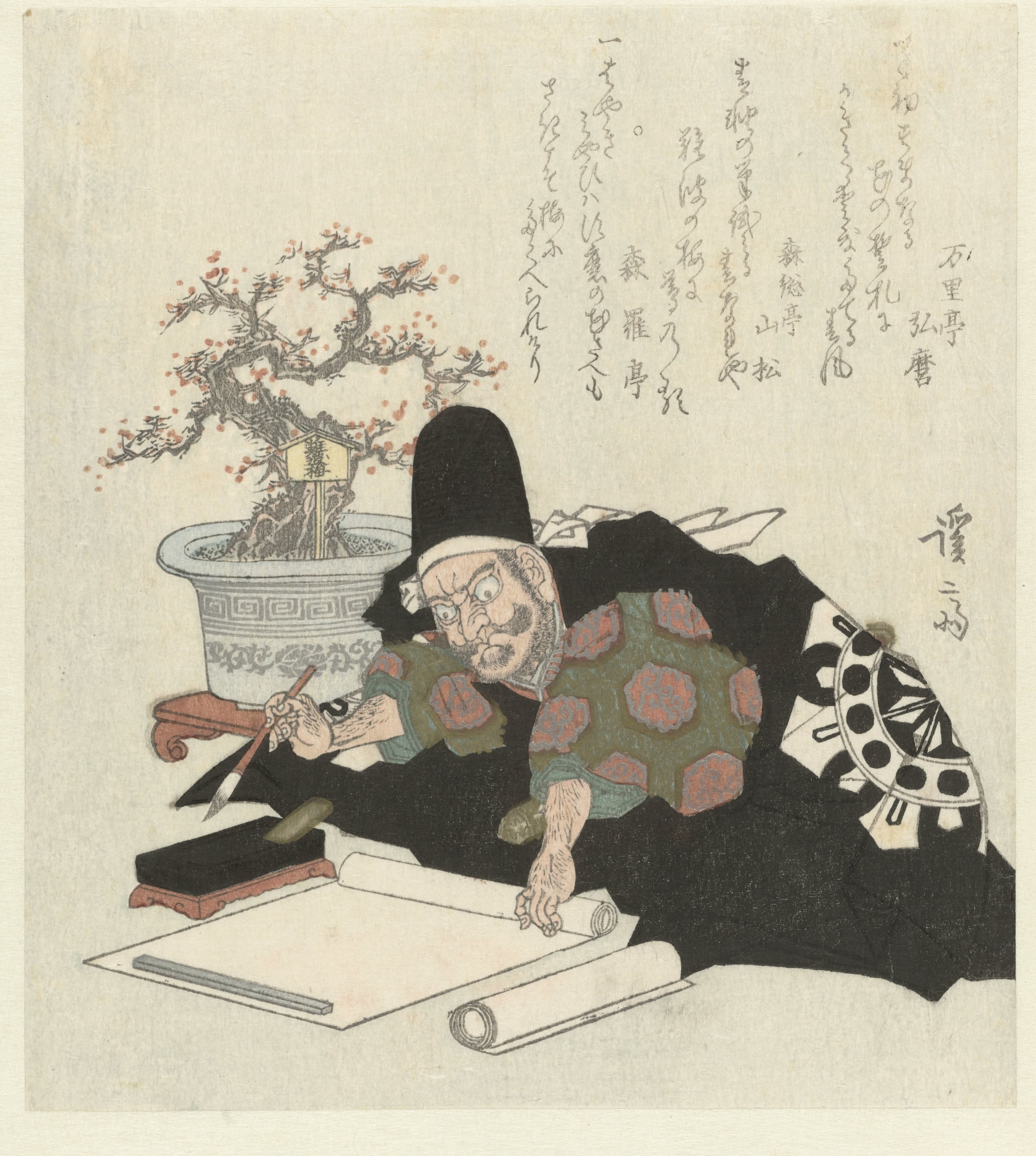 Schrijvende man in zwarte kimono