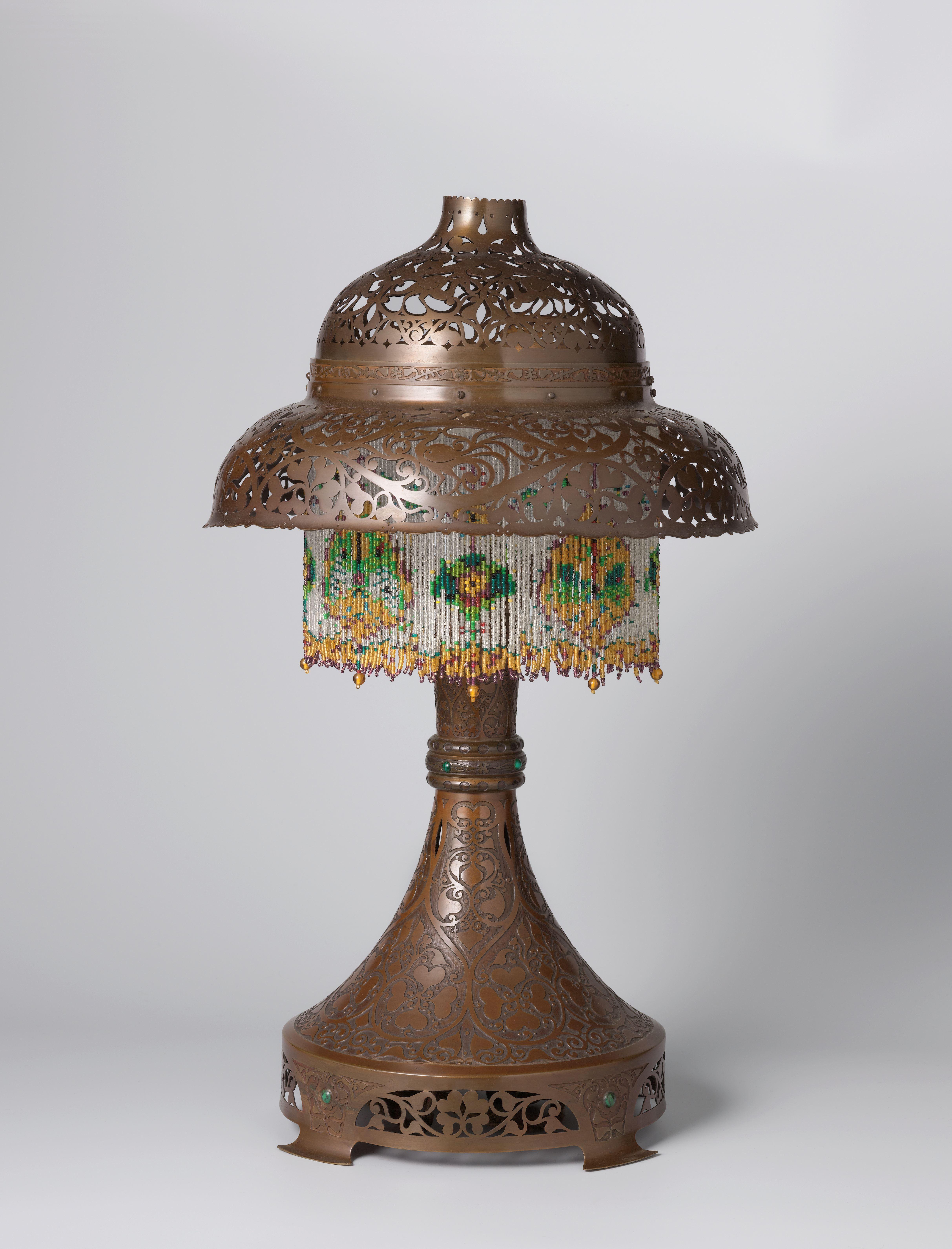 Schemerlamp met ajour-motieven