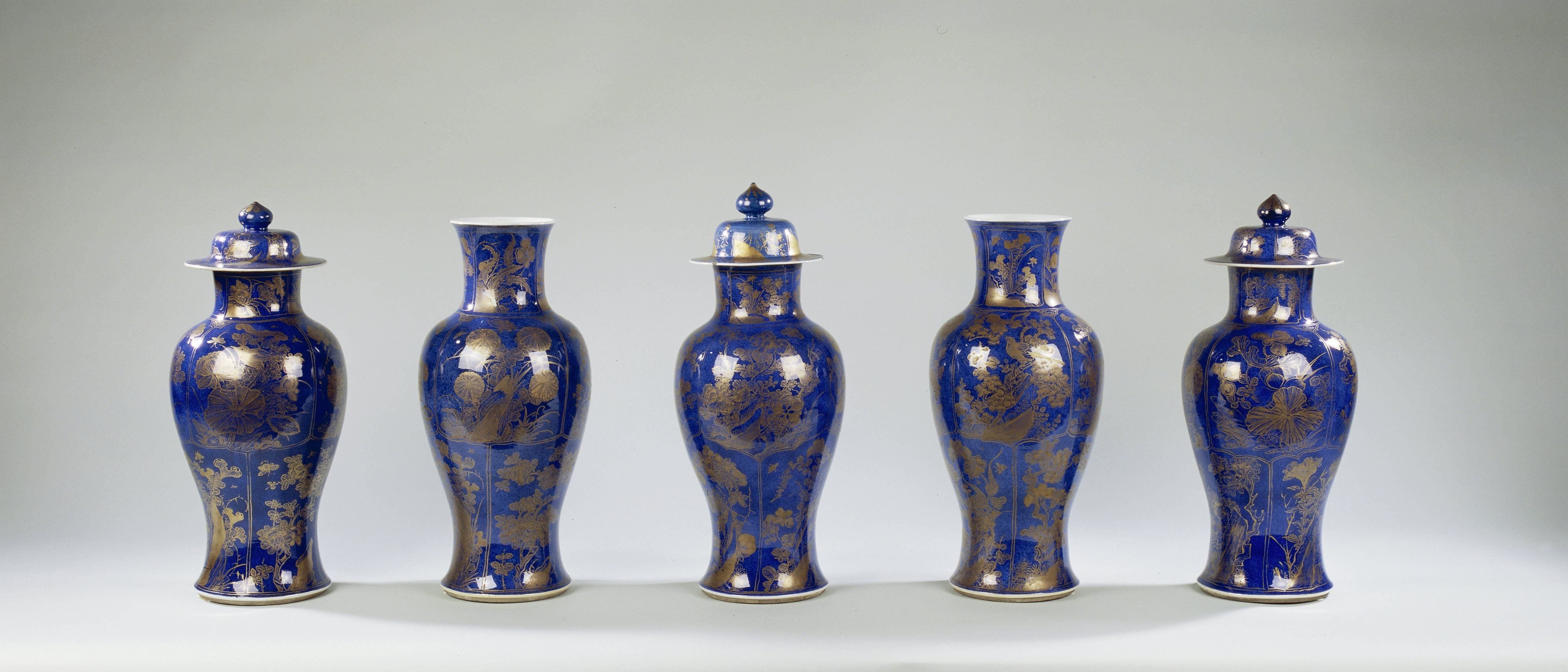 Baluster vase with powder blue and flowering plants and animals in panel decoration