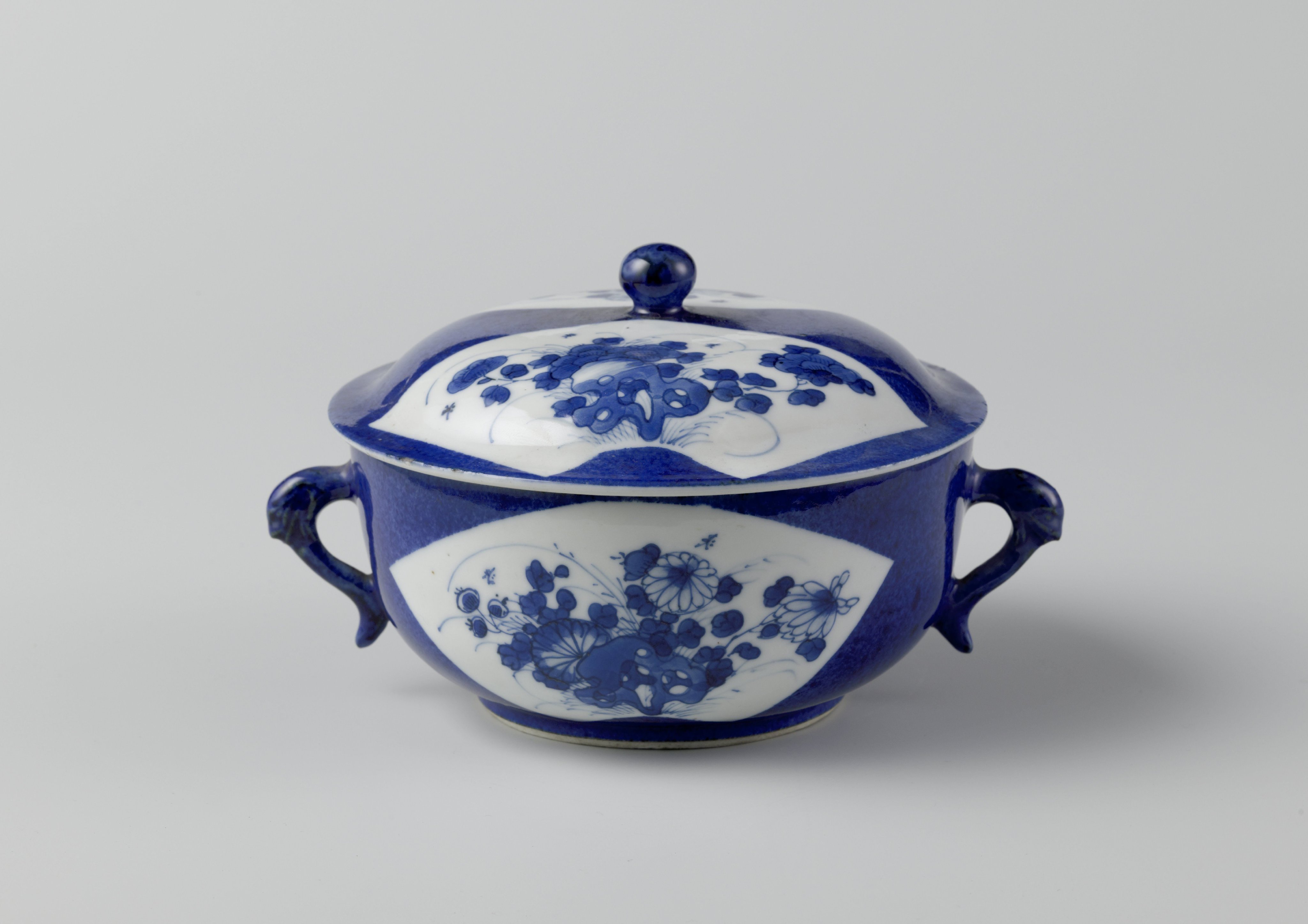 Covered bowl with powder blue and flower sprays in fan-shaped panels