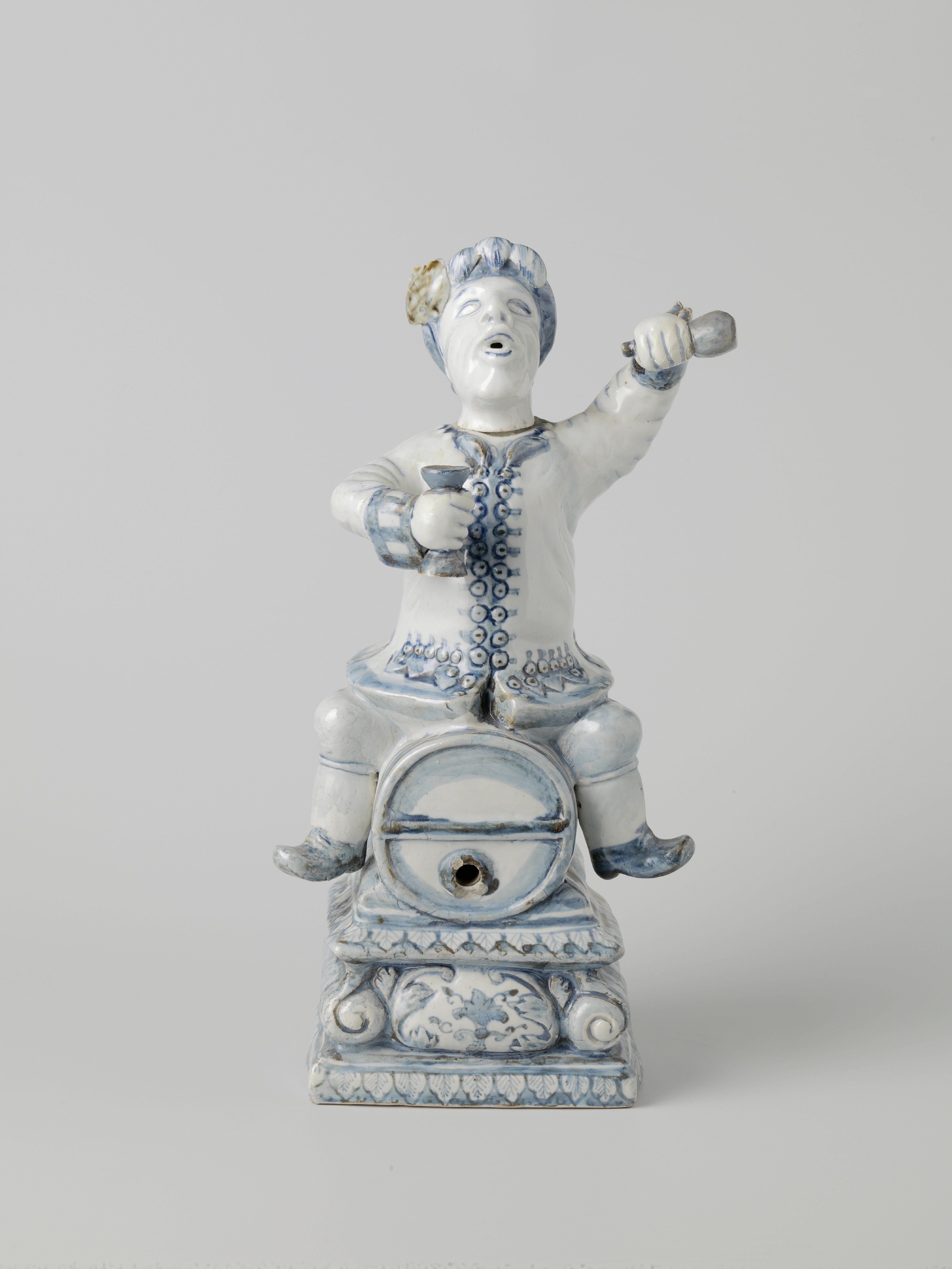 Spirit keg in the shape of a Dutchman sitting astride a barrel