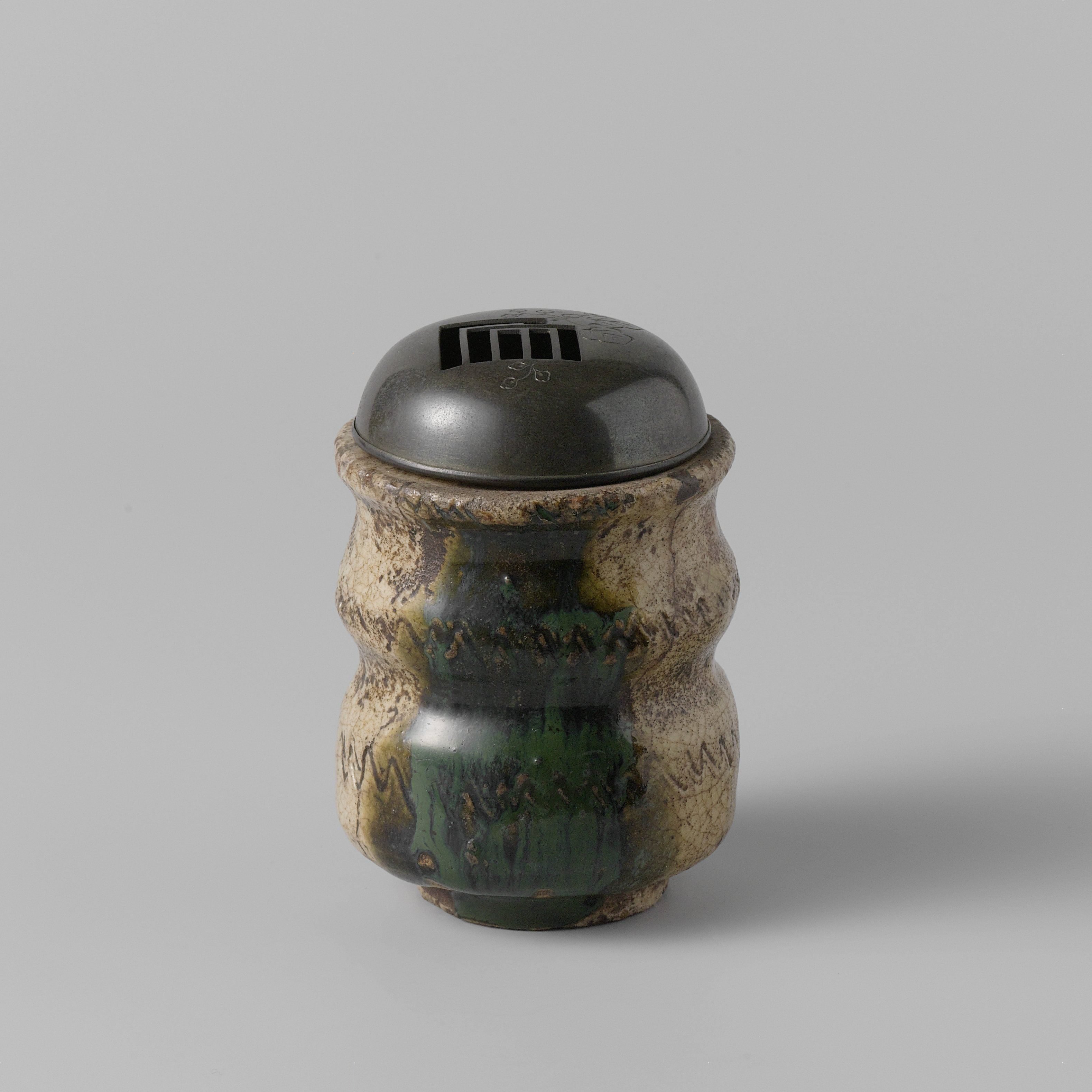 Incense burner with a metal cover