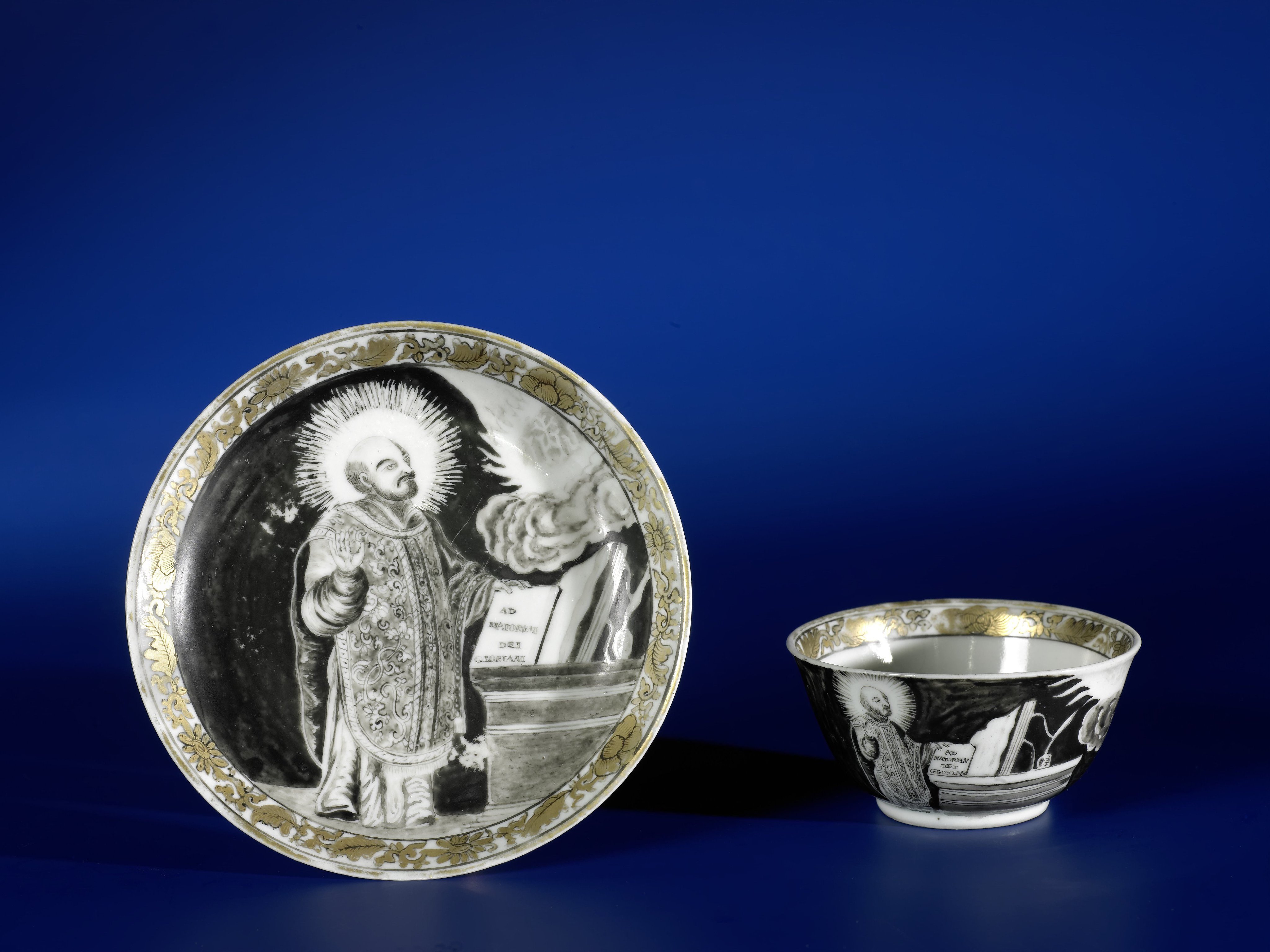 Bell-shaped cup and saucer with an image of Ignatius de Loyola