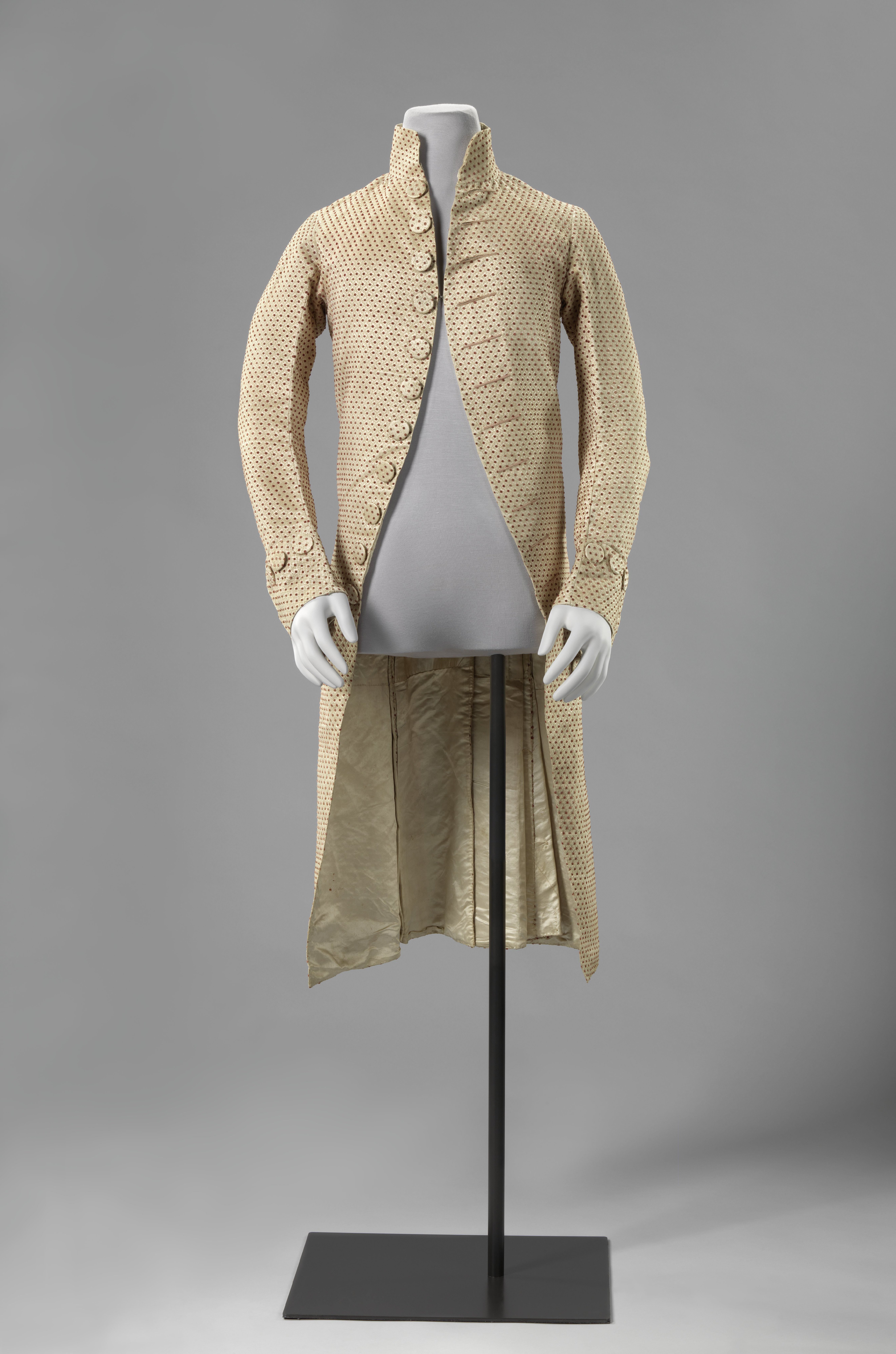Coat with dotted pattern