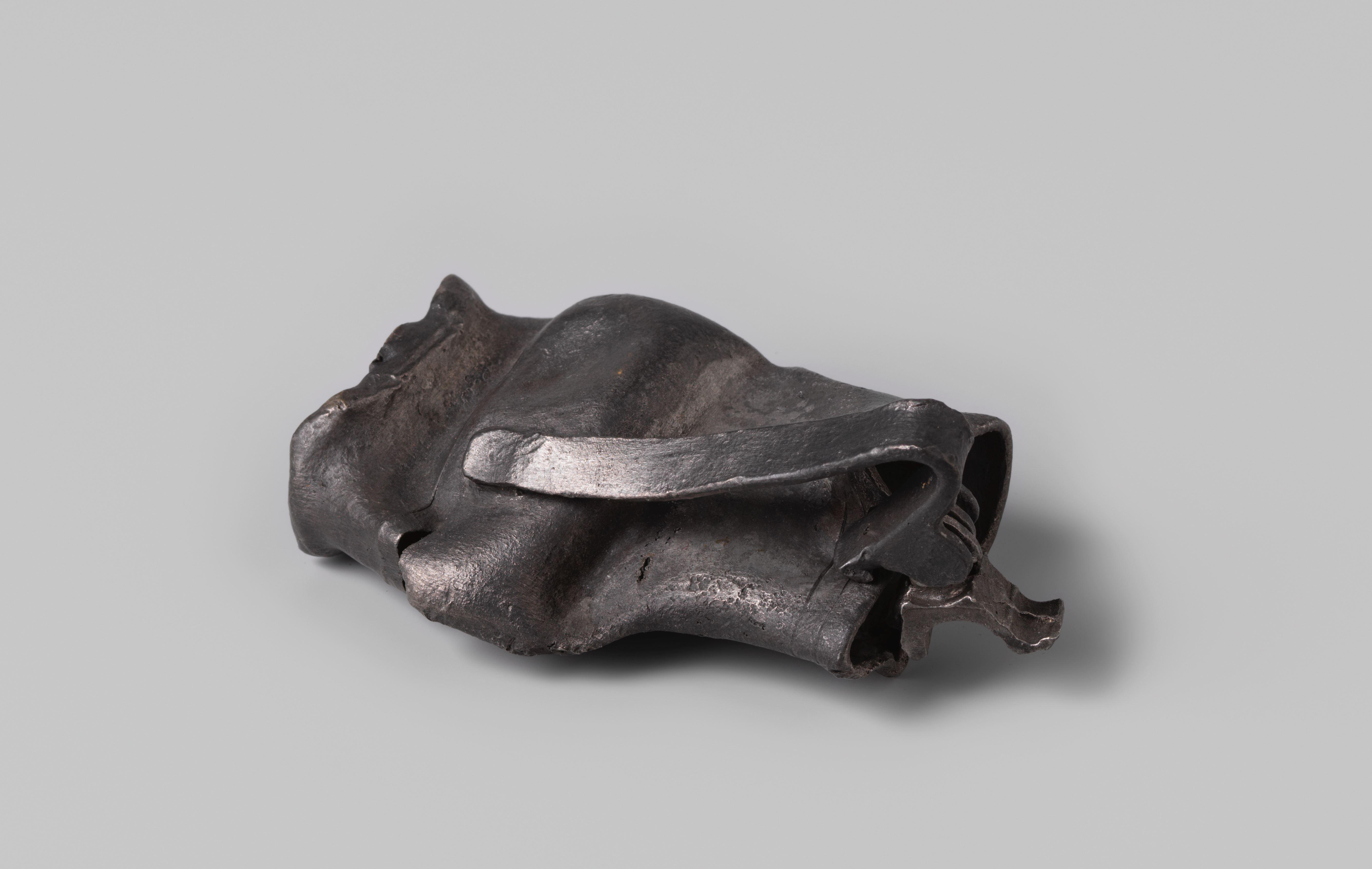 Squashed pewter jug from the wreck of the Dutch East Indiaman Hollandia