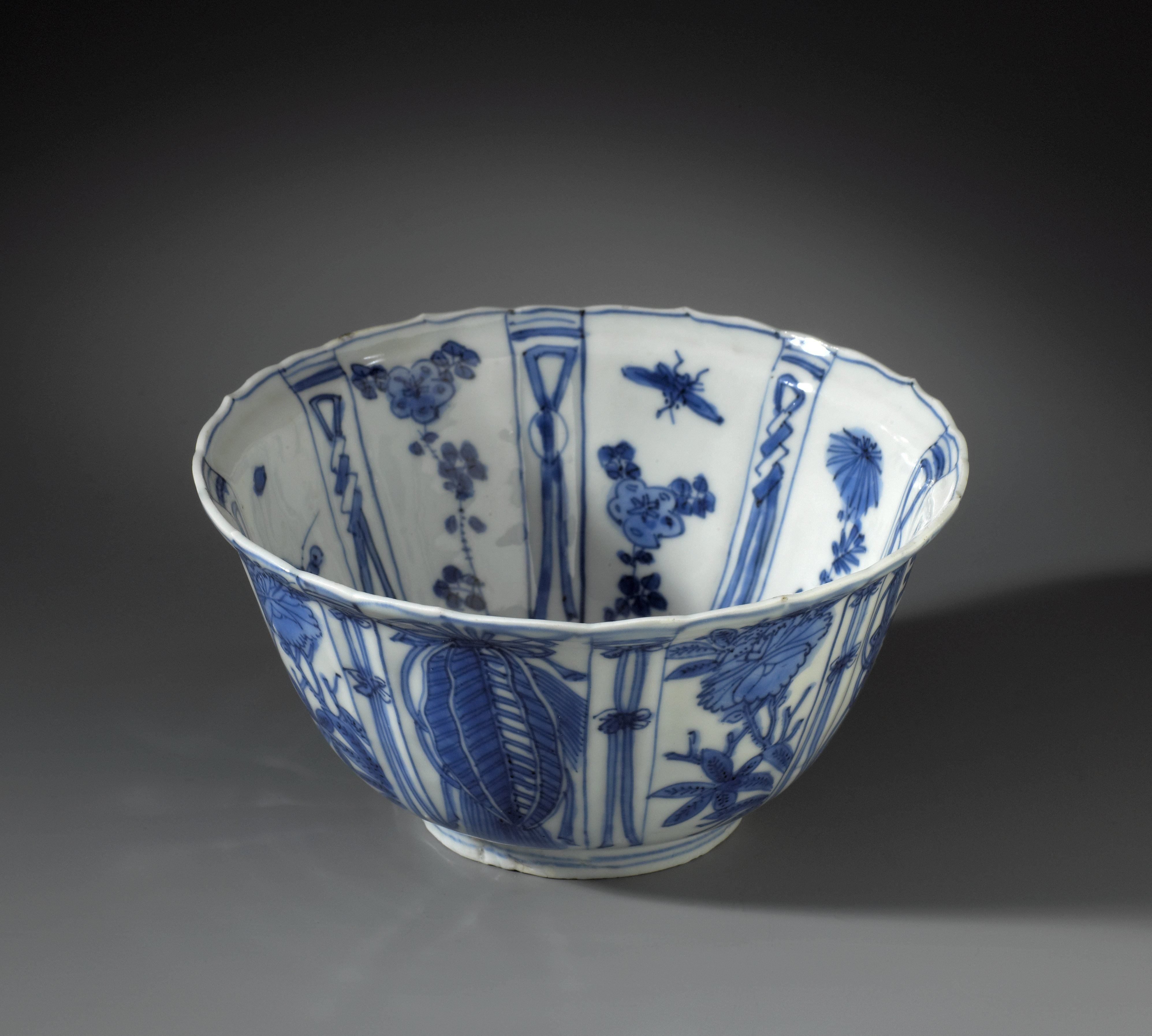 Bowl (crow cup) with a bird on a rock, flower sprays and auspicious symbols in a panel decoration