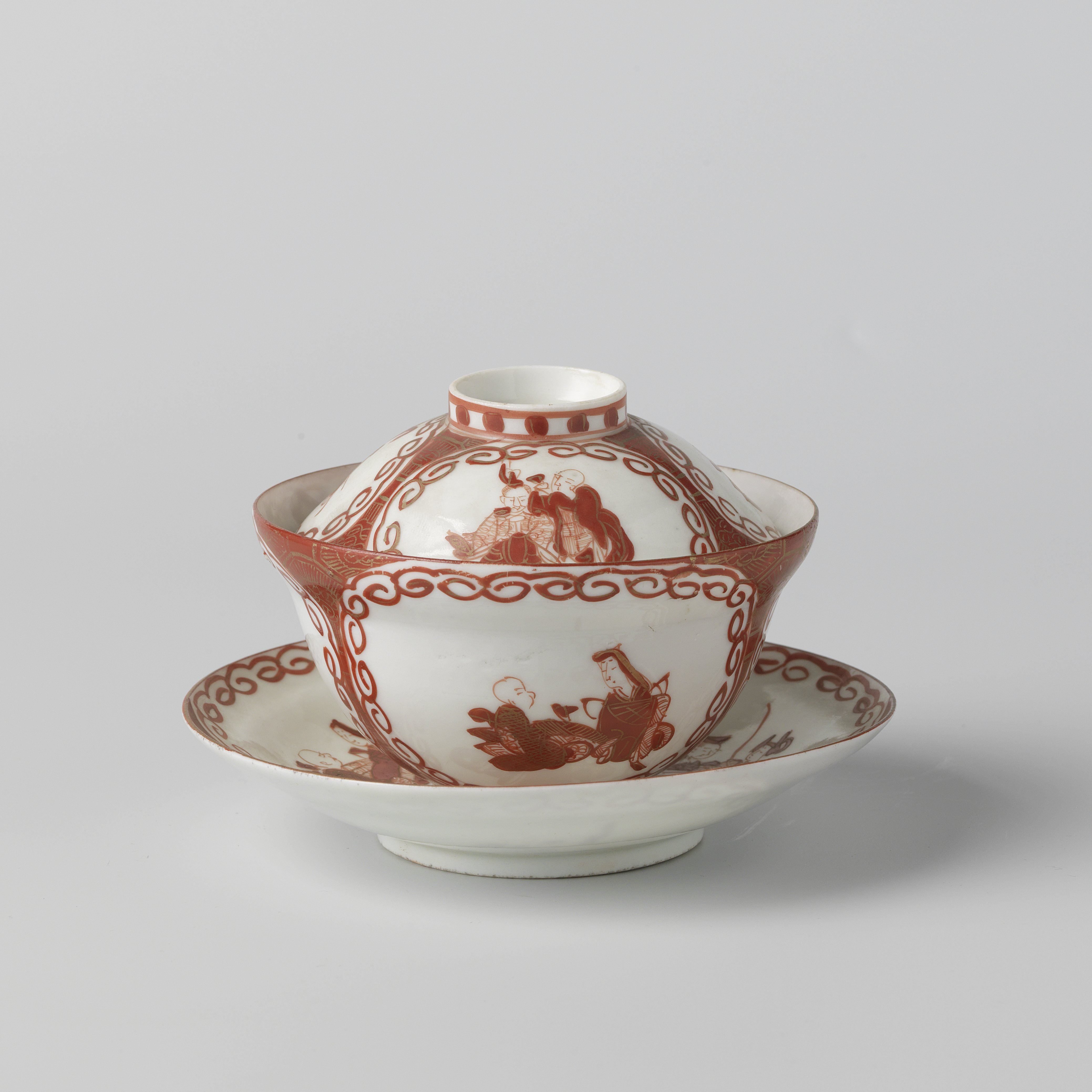 Covered cup and saucer with three panels with two seated figures