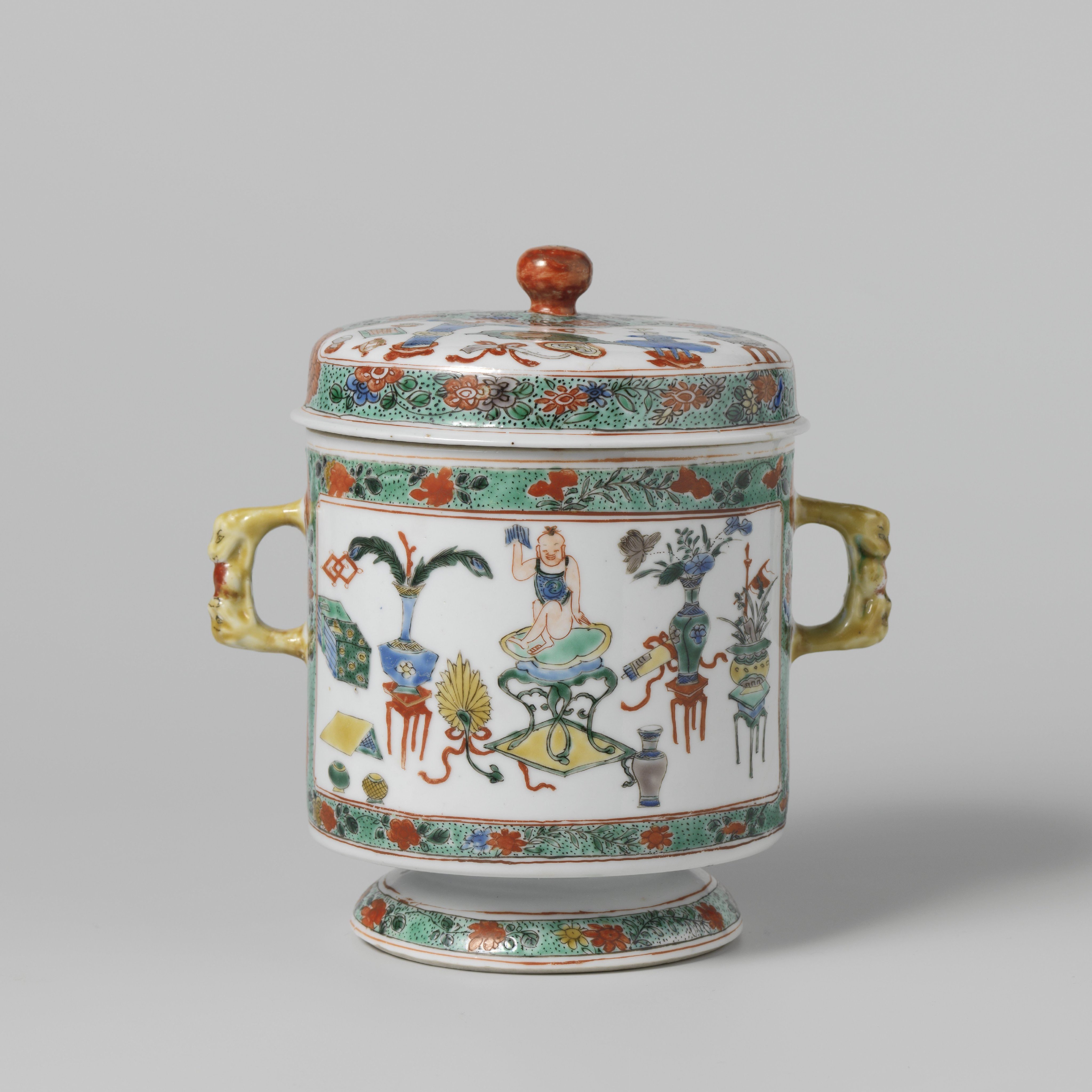 Covered jar with antiquities in panel decoration